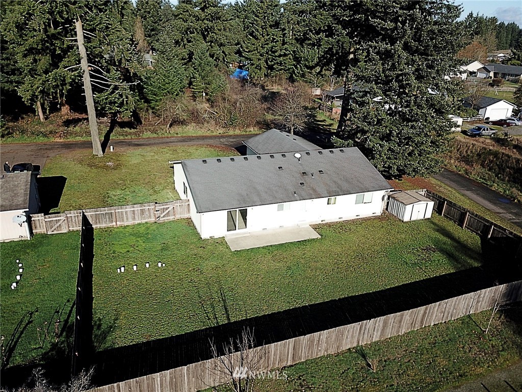 9836 179th Way Southwest Rochester, WA 98579 - Photo 3 of 26 a view of a lake with a yard
