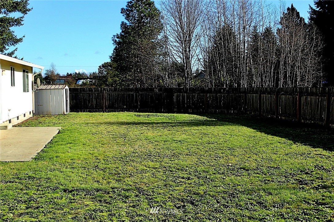 9836 179th Way Southwest Rochester, WA 98579 - Photo 24 of 26 a view of backyard with garden