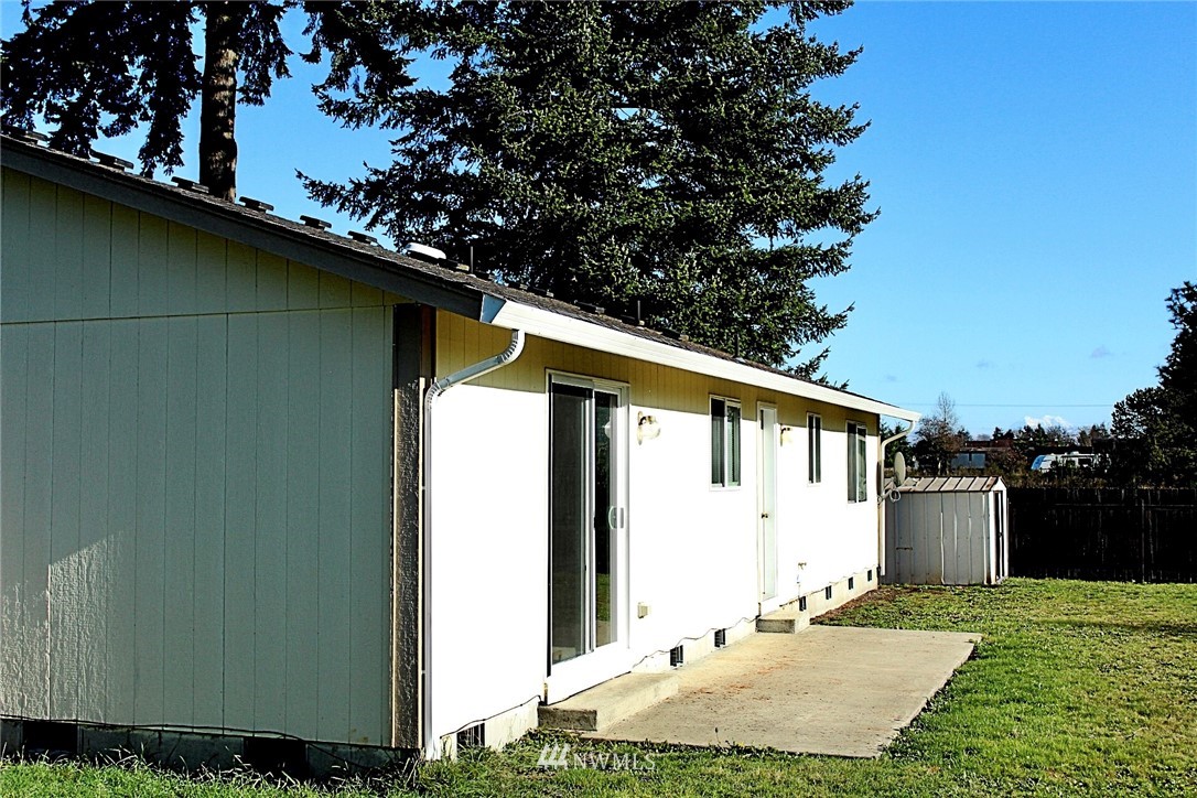 9836 179th Way Southwest Rochester, WA 98579 - Photo 25 of 26 a front view of a house with garden