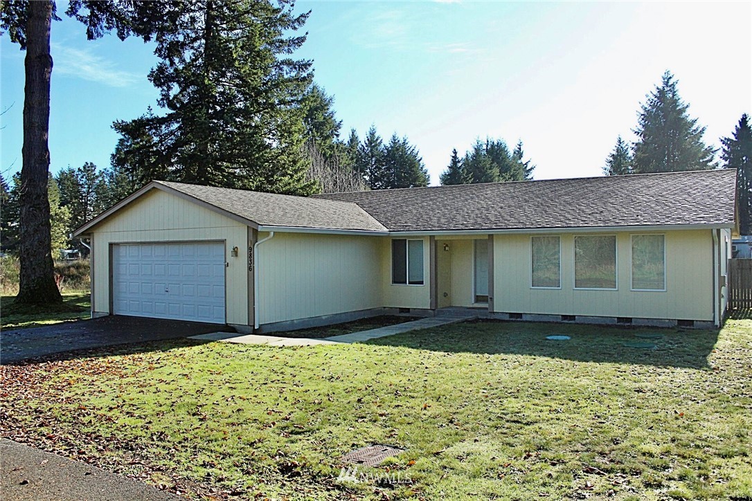 9836 179th Way Southwest Rochester, WA 98579 - Photo 26 of 26 a front view of a house with a yard