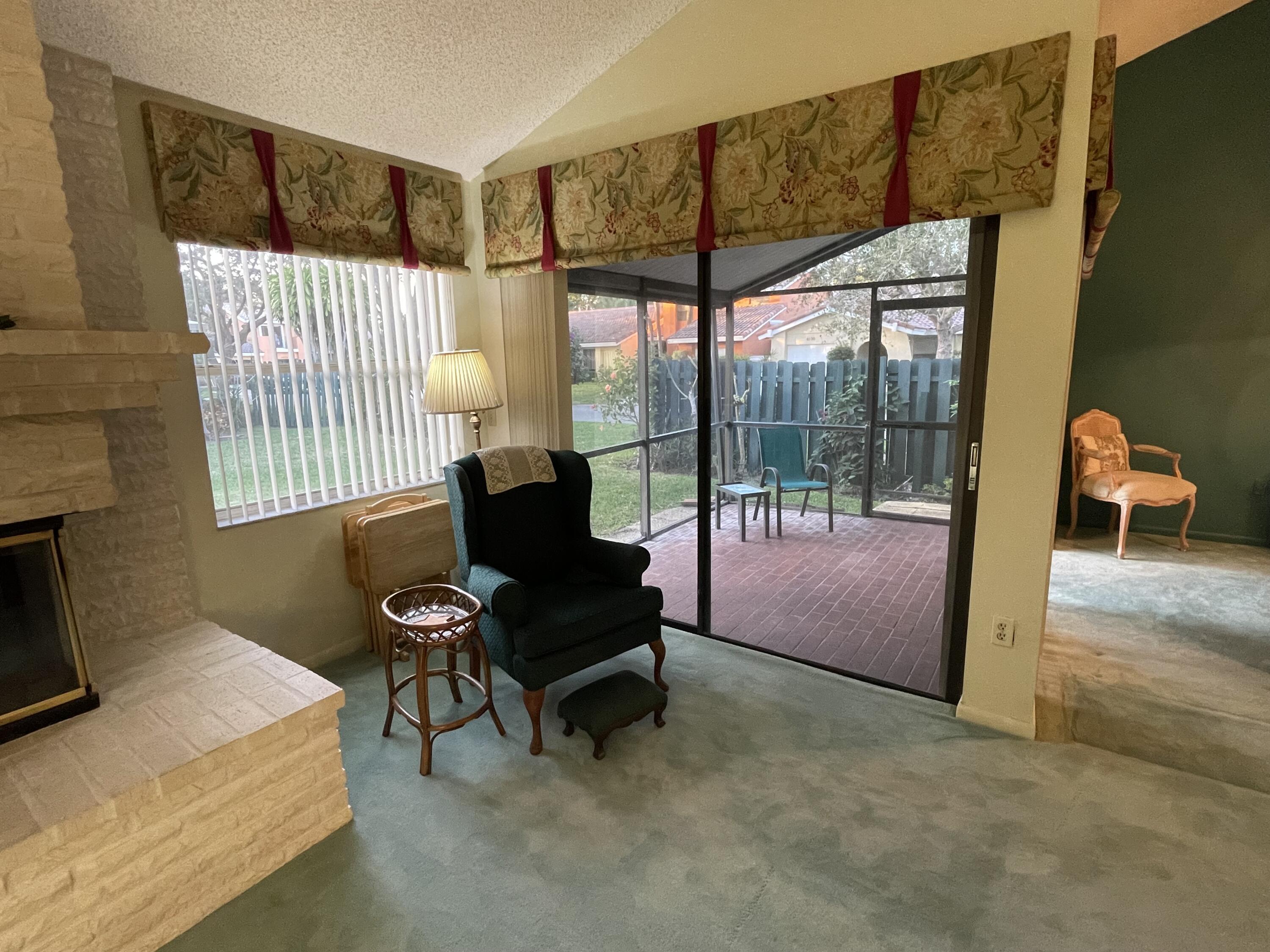 20795 Vía Madeira Boca Raton, FL 33433 - Photo 6 of 25 Looking out at patio from living room