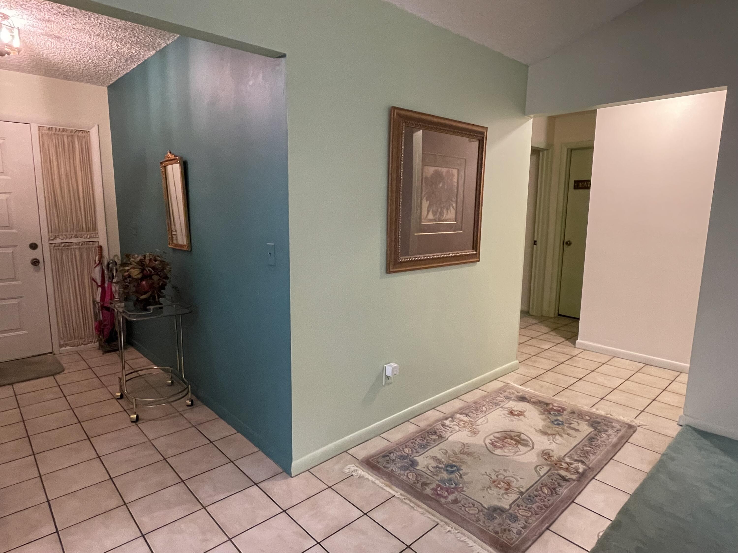 20795 Vía Madeira Boca Raton, FL 33433 - Photo 7 of 25 Foyer and hallway to bedrooms