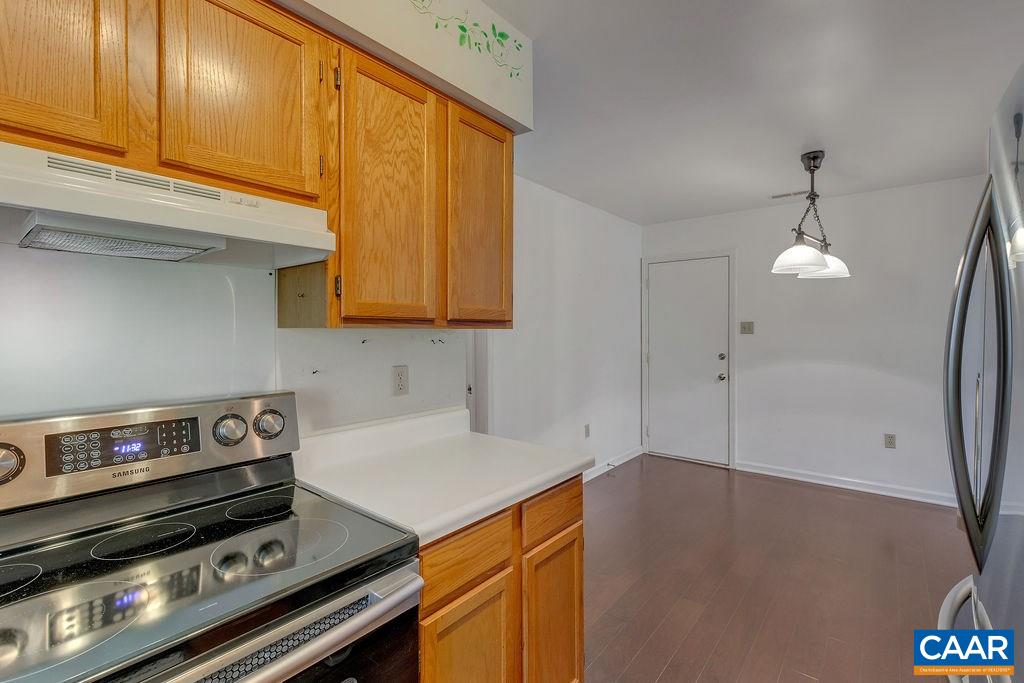 140 Tulip Road Ruckersville, VA 22968 - Photo 11 of 42 a kitchen with a stove and a microwave