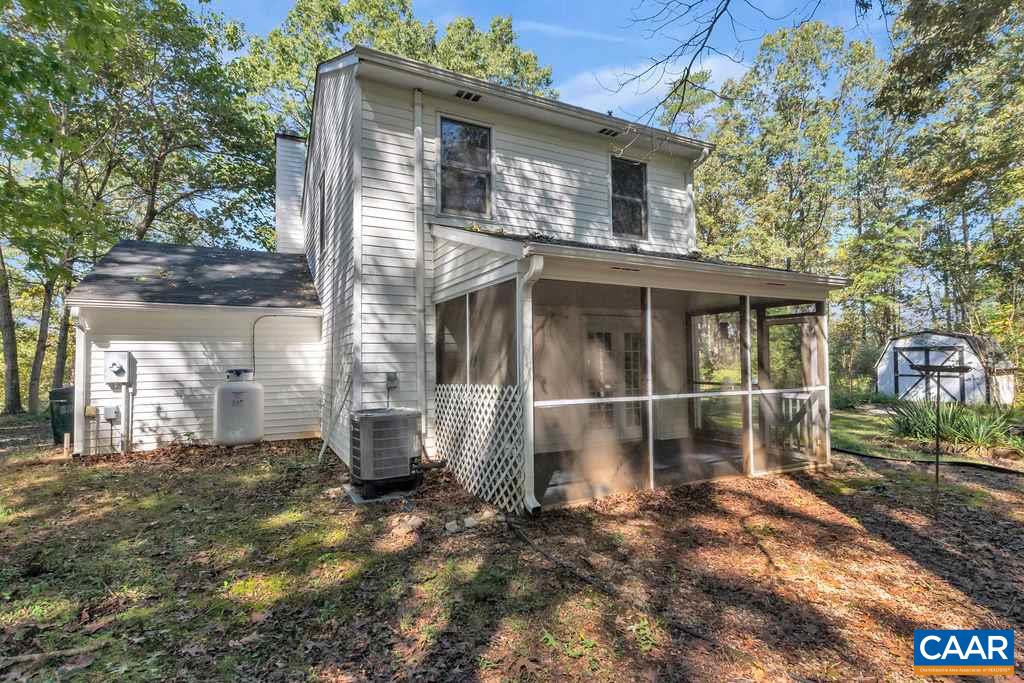 140 Tulip Road Ruckersville, VA 22968 - Photo 30 of 42 a front view of a house with garden