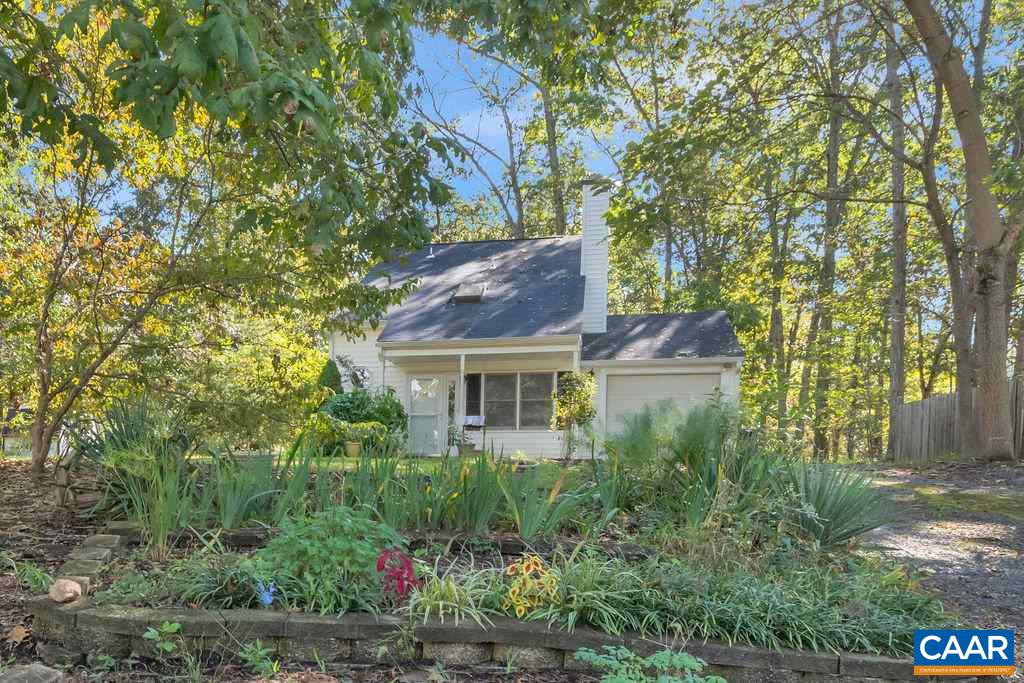 140 Tulip Road Ruckersville, VA 22968 - Photo 3 of 42 a front view of house with yard and trees around