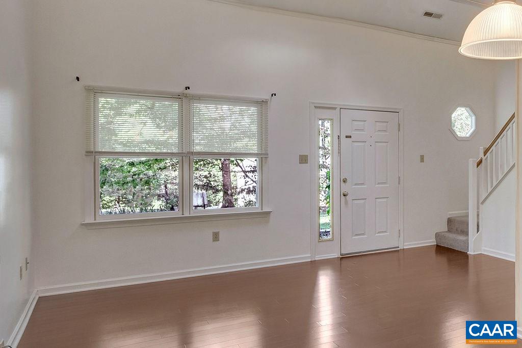 140 Tulip Road Ruckersville, VA 22968 - Photo 7 of 42 an empty room with windows and closet