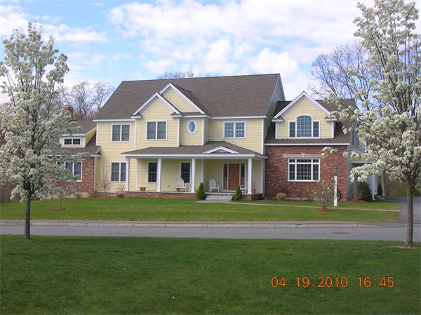 115 Carter Field Road North Andover, MA 01845 - Photo 1 of 13 a front view of a house with a garden