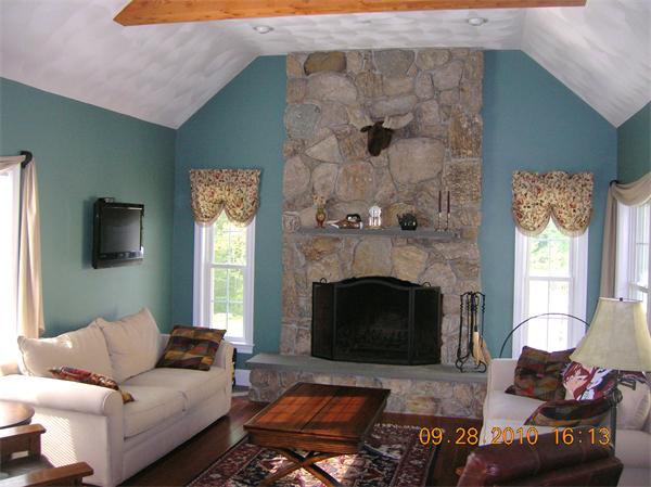 115 Carter Field Road North Andover, MA 01845 - Photo 13 of 13 a living room with furniture and a fireplace
