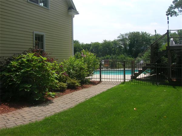 115 Carter Field Road North Andover, MA 01845 - Photo 6 of 13 a view of a backyard with plants and a garden