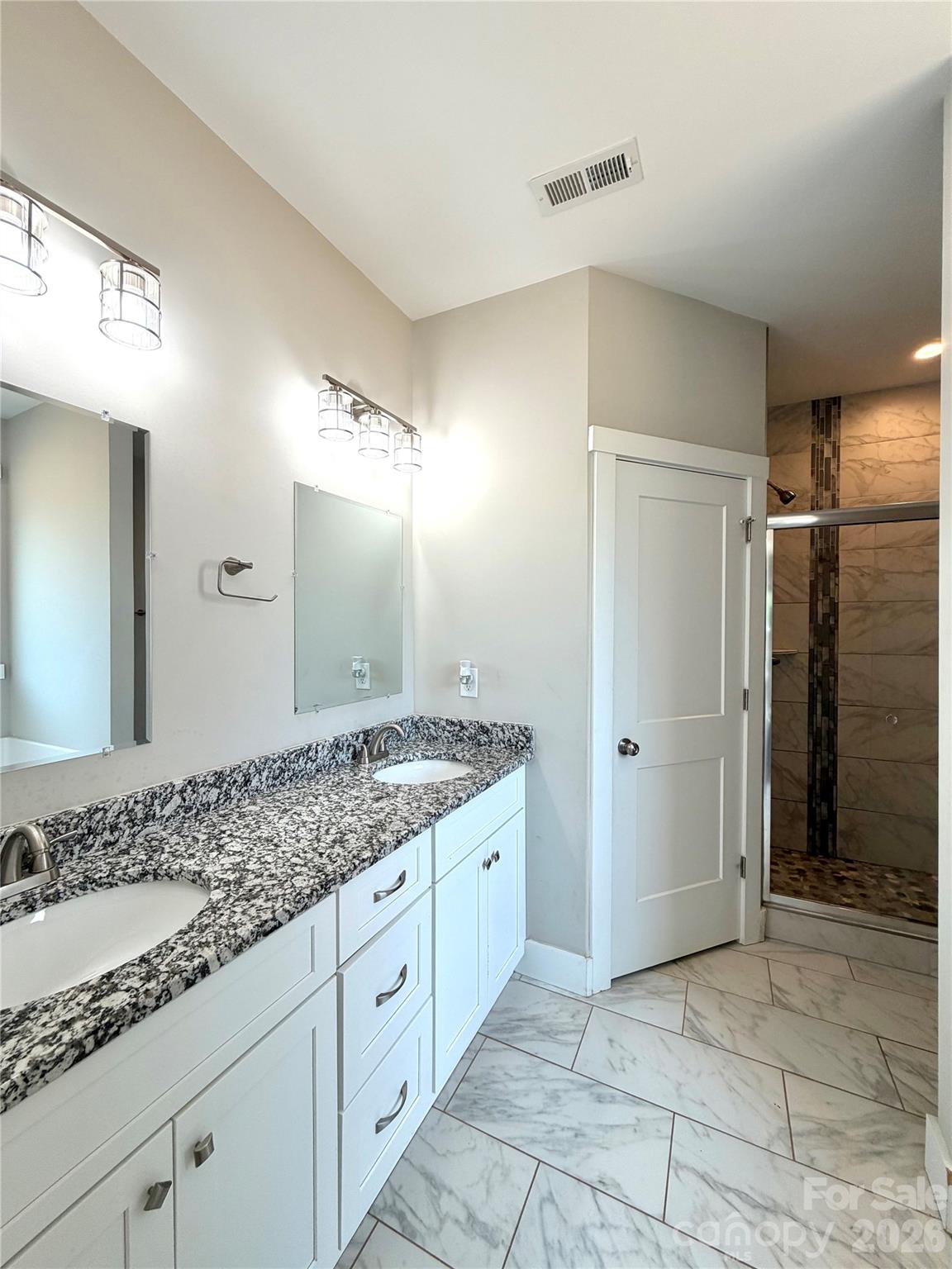 1473 Pleasant School Road Gaffney, SC 29341 - Photo 12 of 16 a bathroom with a granite countertop sink and a mirror