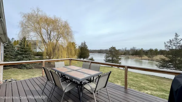 a workspace with furniture and a window