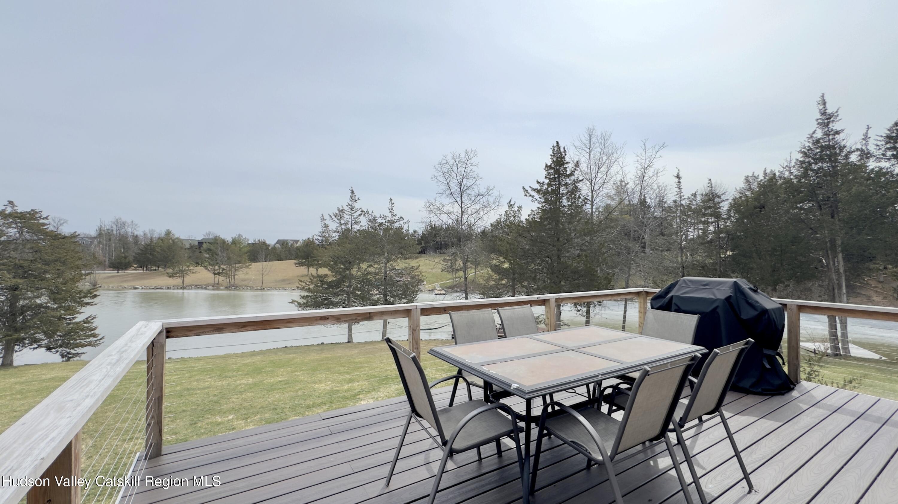 70 Travis Place Athens, NY 12015 - Photo 16 of 57 a view of a balcony with mountain view and sitting space