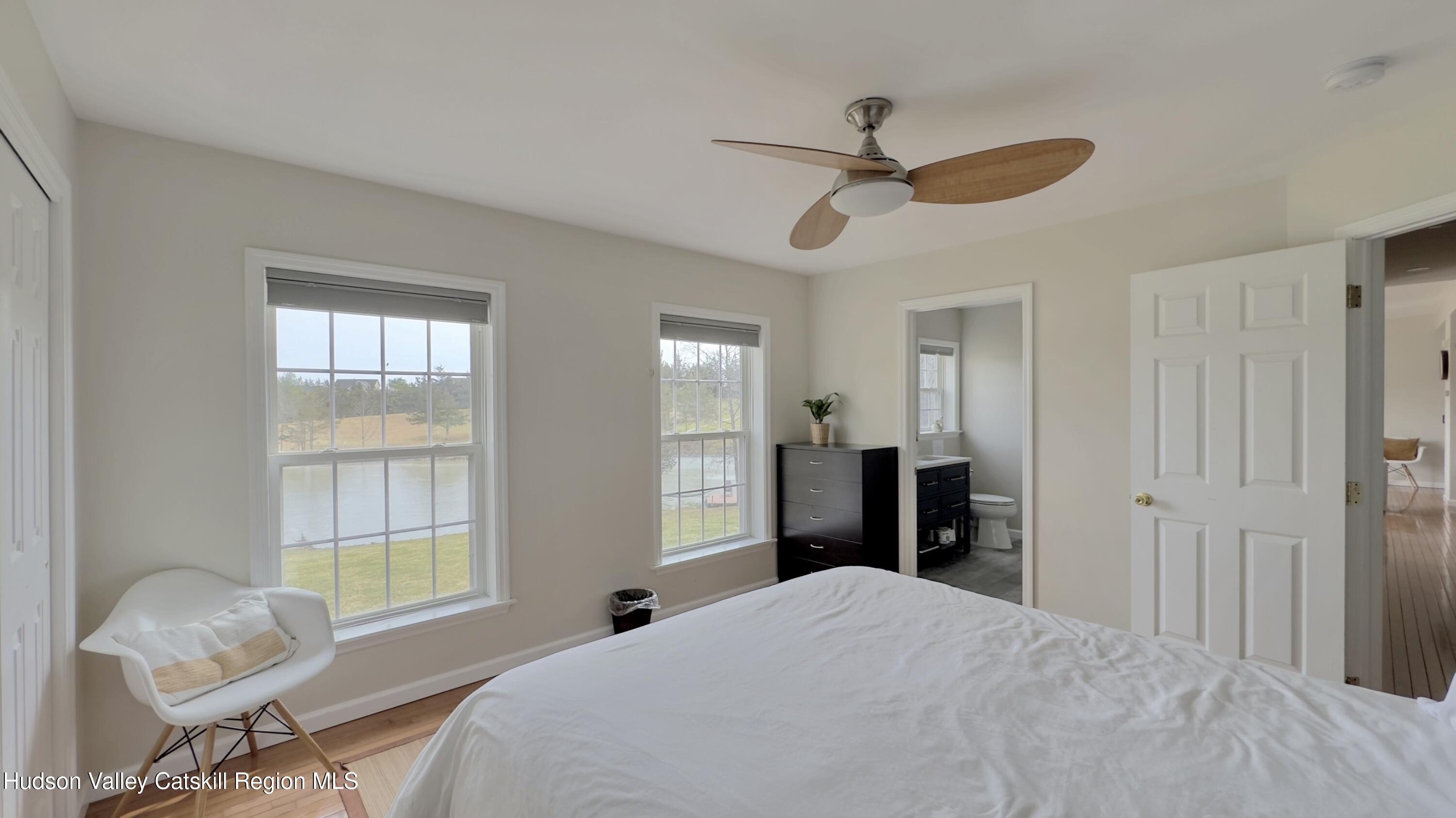 70 Travis Place Athens, NY 12015 - Photo 23 of 57 a bedroom with a bed and window