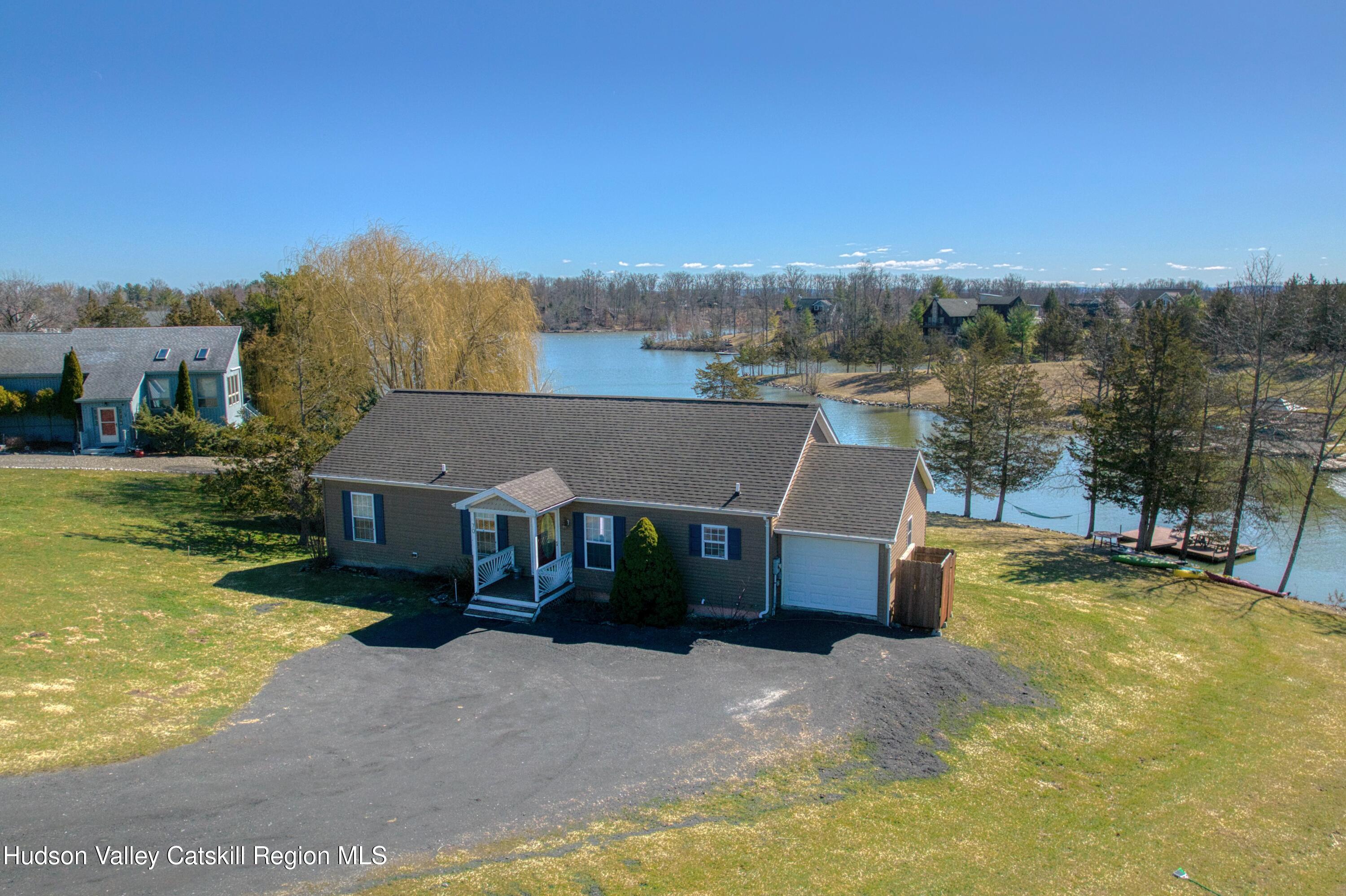 70 Travis Place Athens, NY 12015 - Photo 3 of 57 a aerial view of a house with a big yard