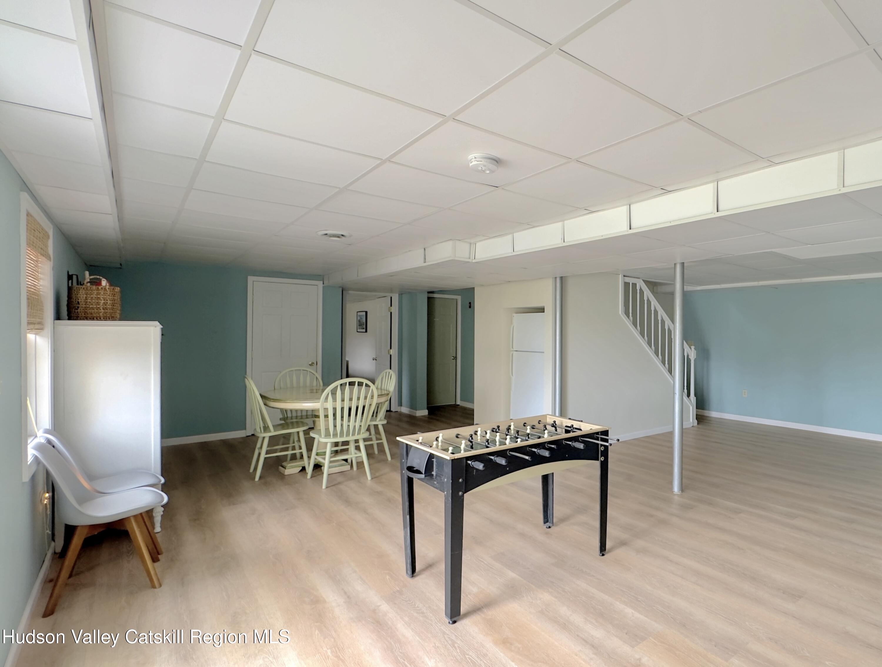 70 Travis Place Athens, NY 12015 - Photo 38 of 57 a dining room with furniture and wooden floor