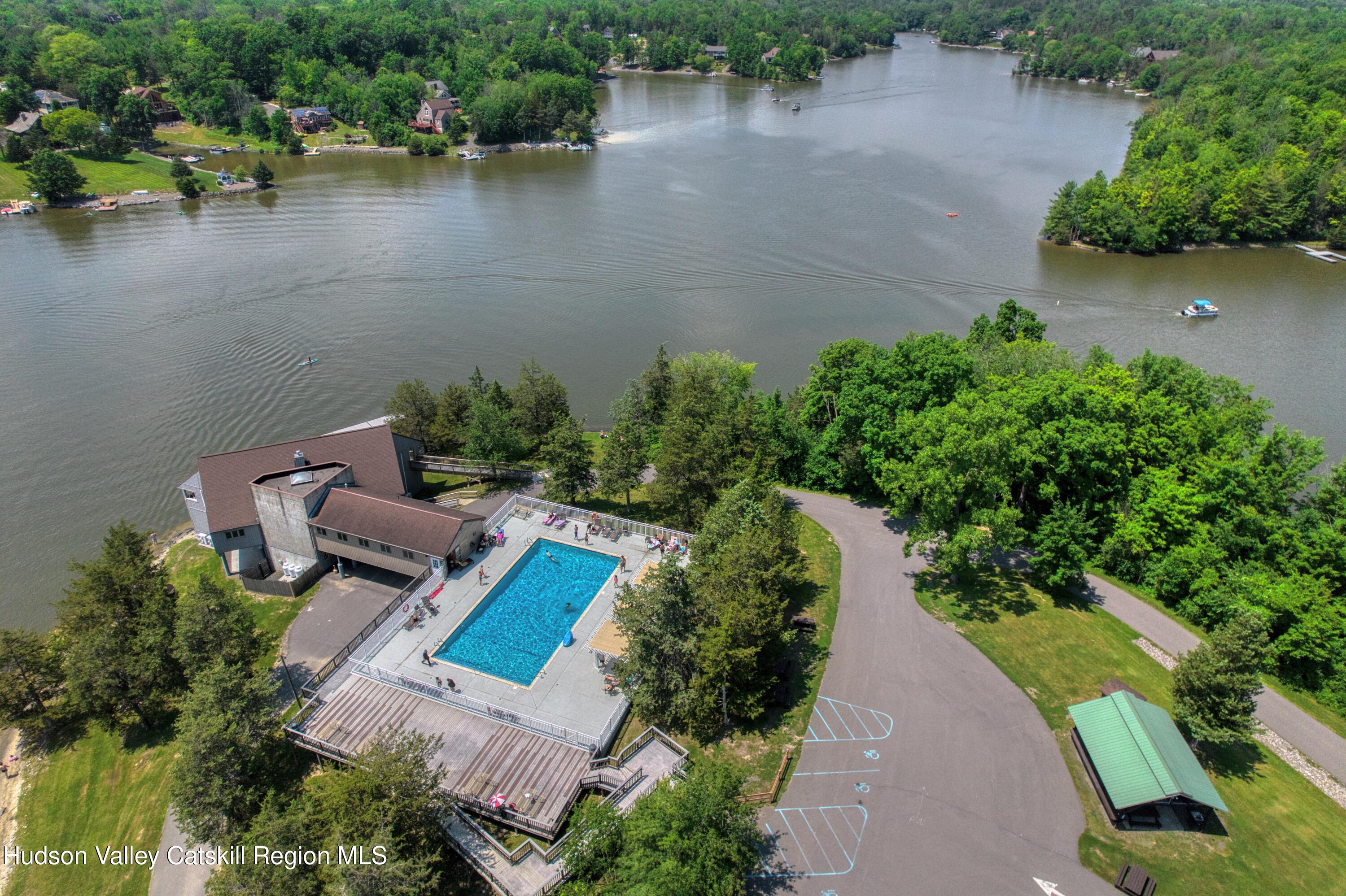 70 Travis Place Athens, NY 12015 - Photo 53 of 57 an aerial view of a house with outdoor space and lake view