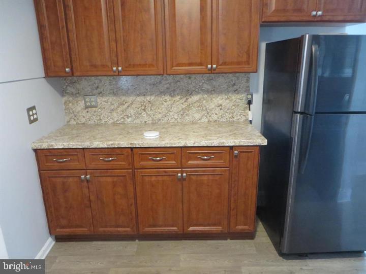 703 Willitts Avenue Audubon, NJ 08106 - Photo 3 of 6 a close view of wooden cabinets