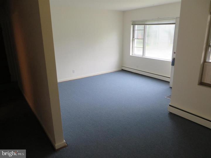 703 Willitts Avenue Audubon, NJ 08106 - Photo 5 of 6 an empty room with a window