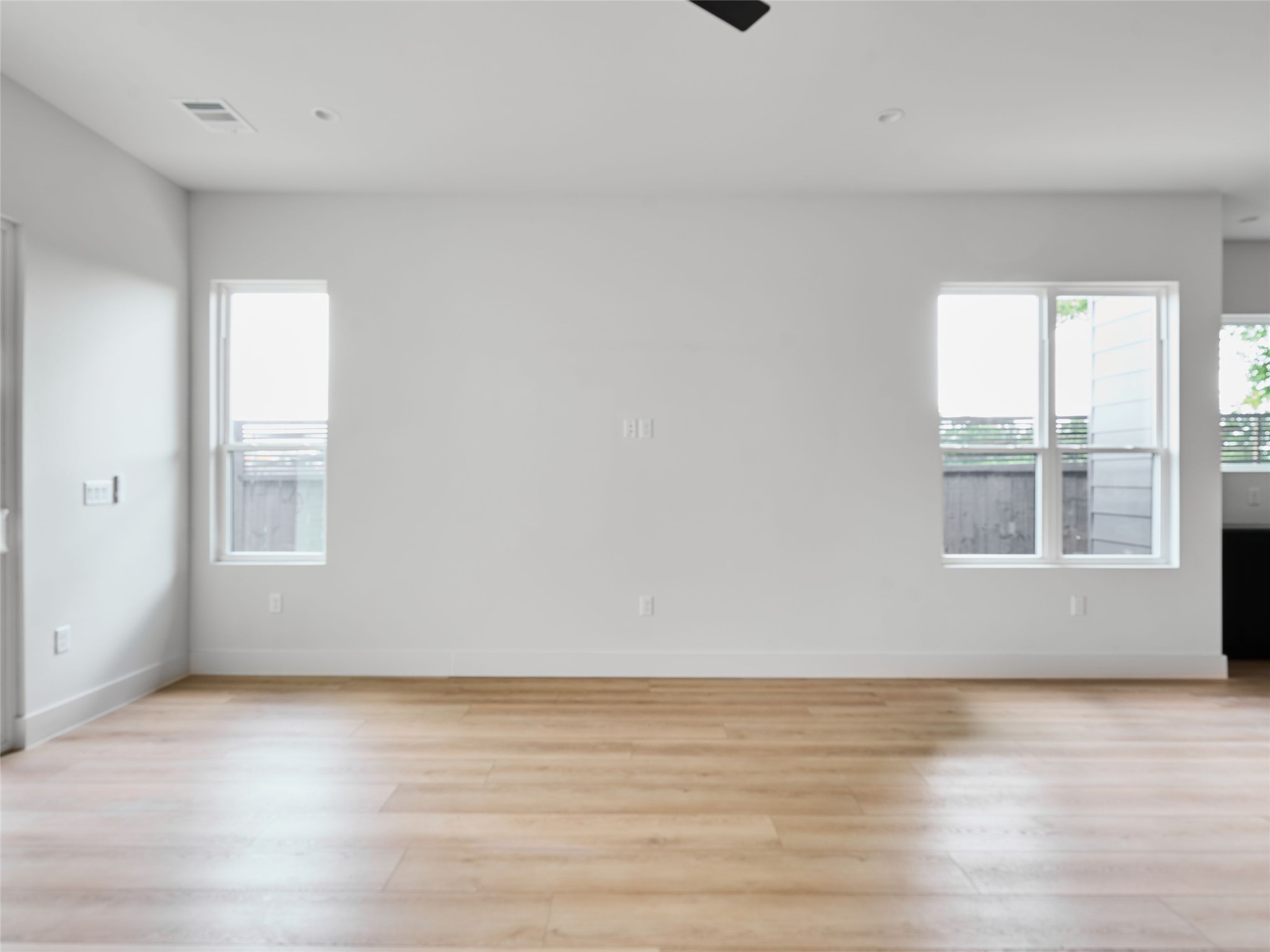 412 Hackberry Lane, Unit 2 Austin, TX 78753 - Photo 16 of 40 Spare room featuring light wood-type flooring