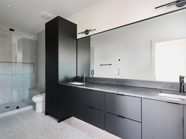 a bathroom with a sink and mirror