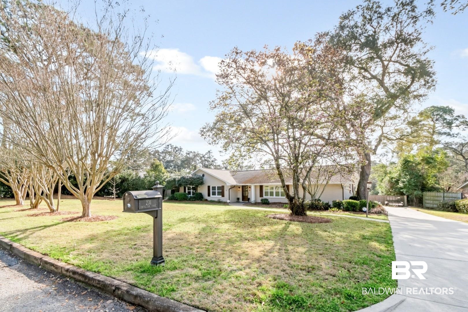 231 Rochester Road Mobile, AL 36608 - Photo 50 of 51 Ranch-style home with concrete driveway, a front yard, a garage, and a porch