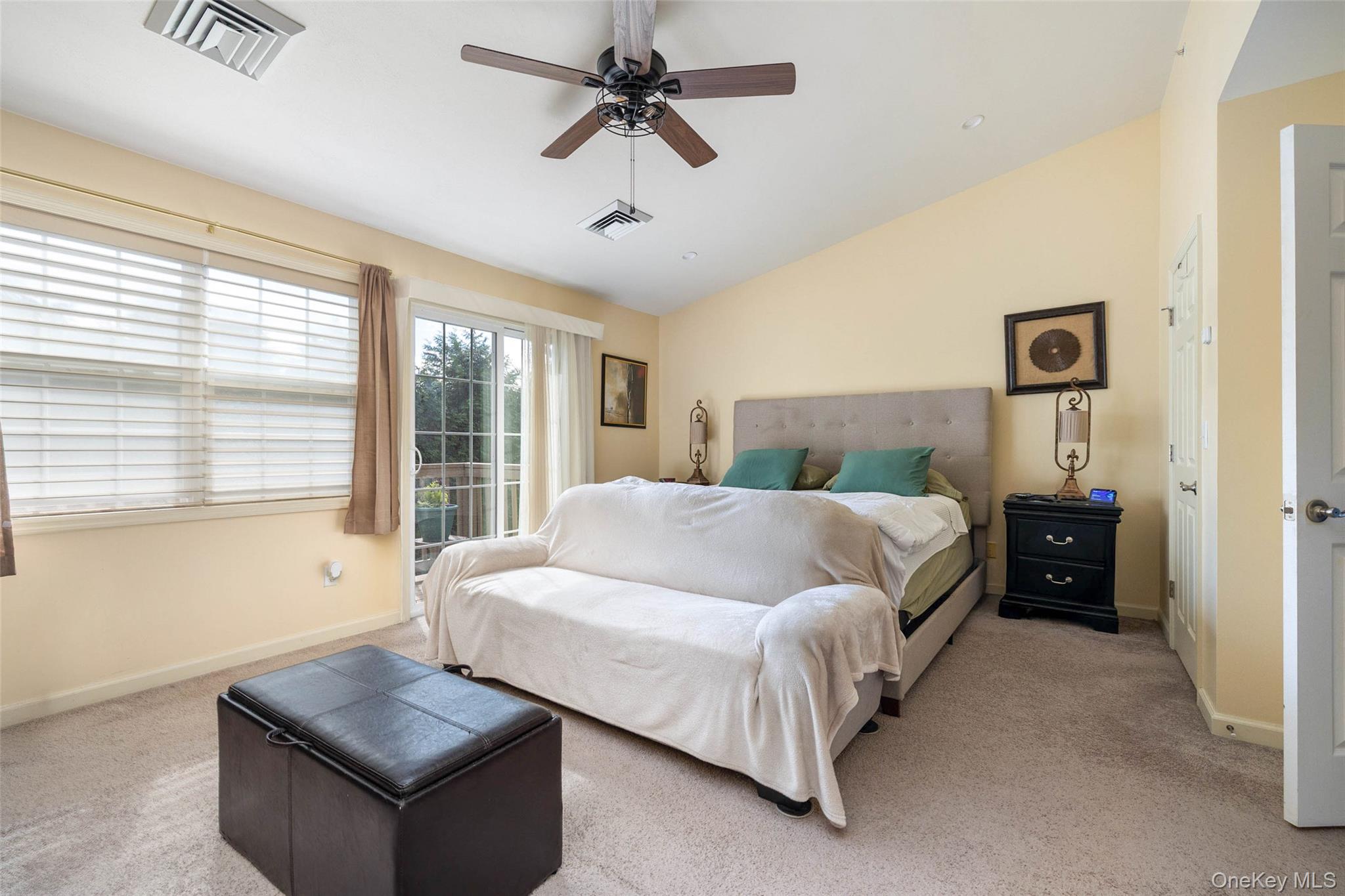 121 Willow Lane Valley Stream, NY 11580 - Photo 15 of 30 Bedroom with lofted ceiling, carpet, and a ceiling fan