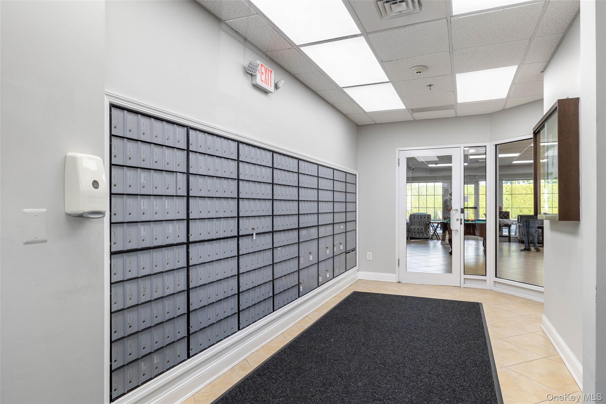 121 Willow Lane Valley Stream, NY 11580 - Photo 24 of 30 Building lobby featuring a paneled ceiling