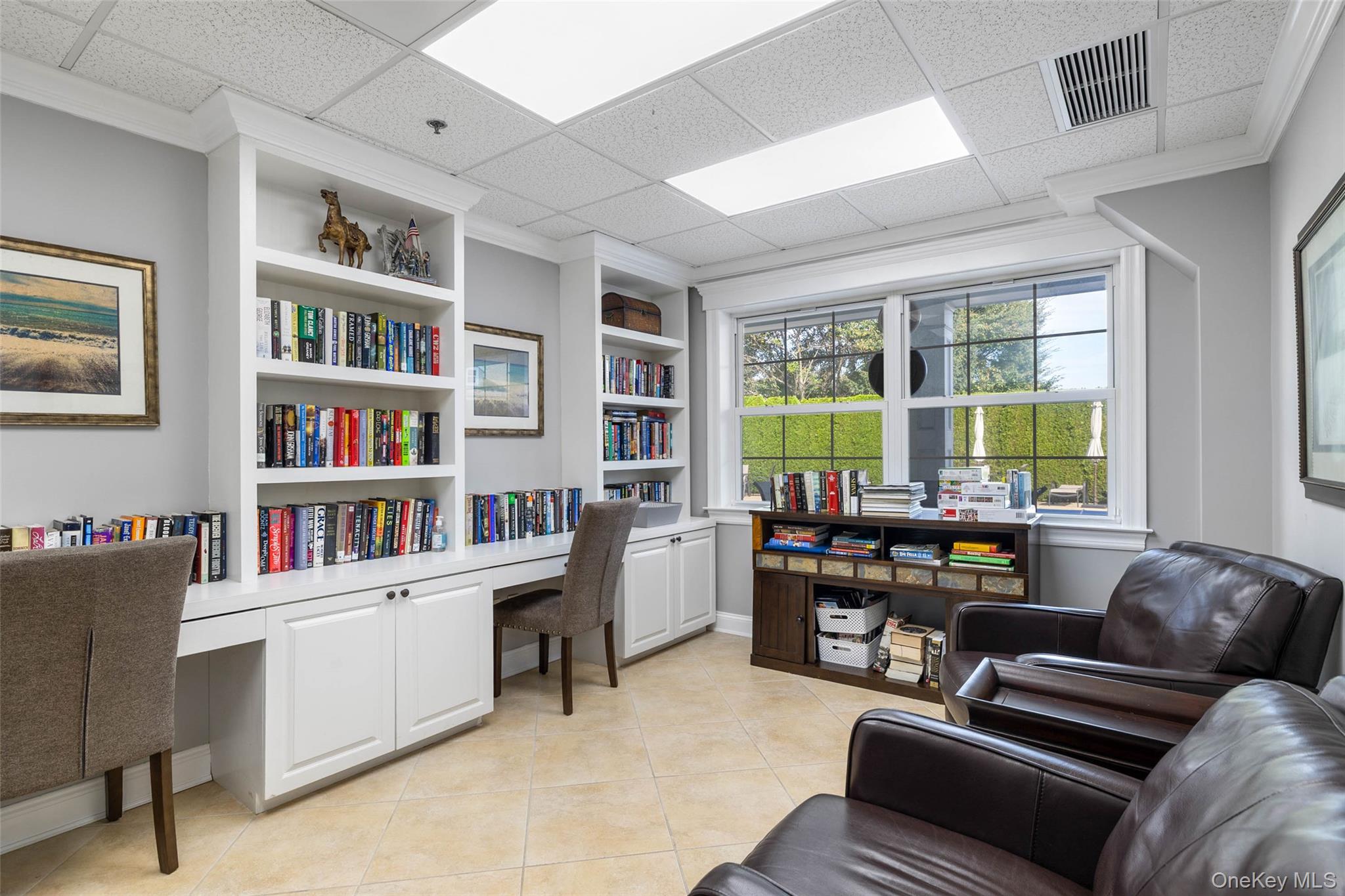 121 Willow Lane Valley Stream, NY 11580 - Photo 29 of 30 Office space featuring built in desk, built in features, light tile patterned flooring, ornamental molding, and a paneled ceiling