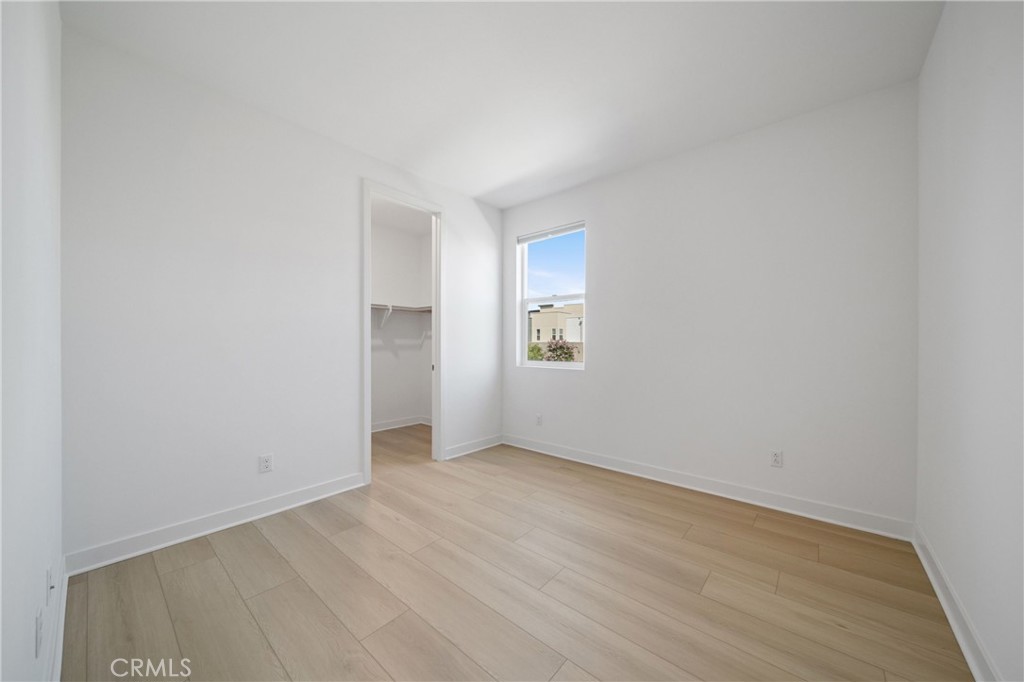 187 Yugen Irvine, CA 92618 - Photo 20 of 31 an empty room with a bathroom space and windows