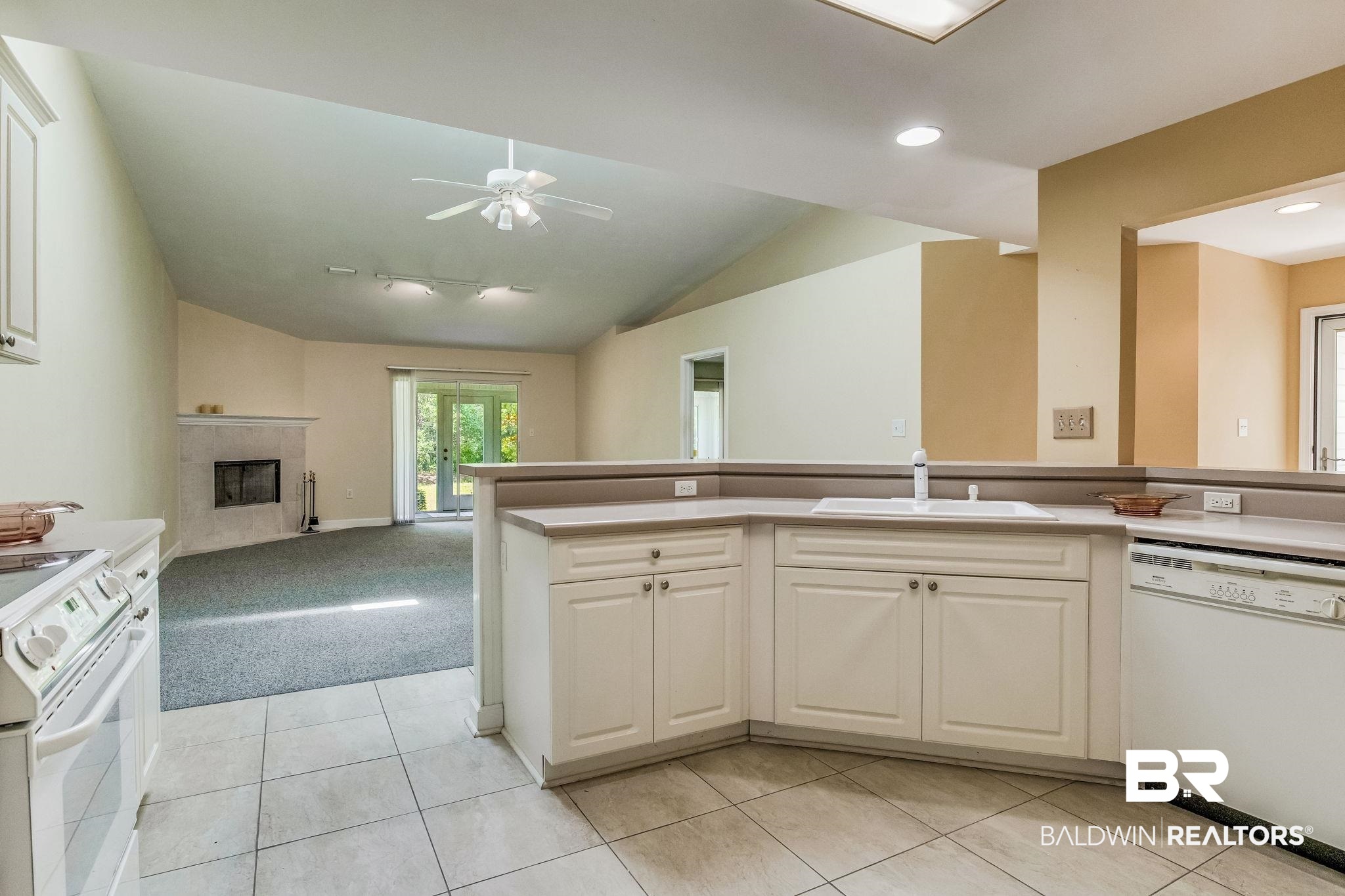 3200 Loop Road, Unit 66 Orange Beach, AL 36561 - Photo 16 of 28 enterkitchen through the garage.