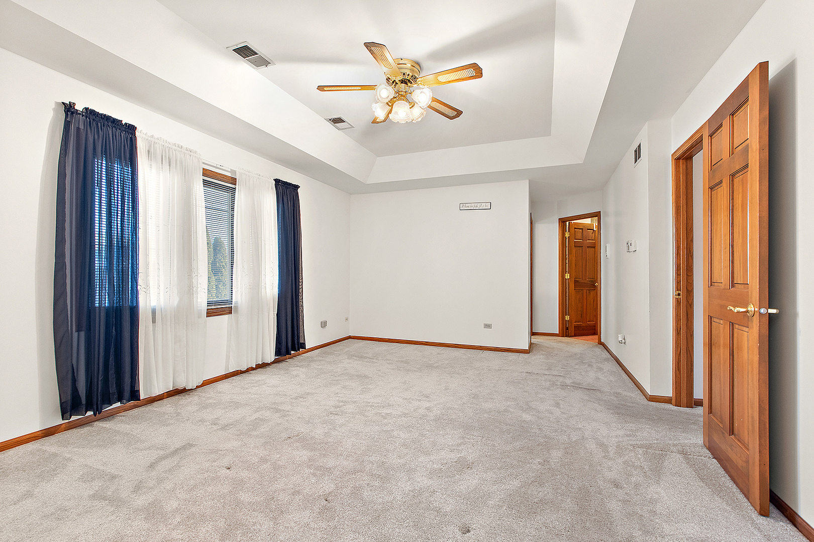 16221 Kingsport Road Orland Park, IL 60467 - Photo 28 of 58 a view of an empty room with a window