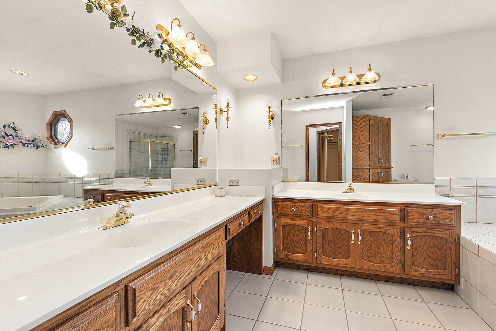 16221 Kingsport Road Orland Park, IL 60467 - Photo 30 of 58 a spacious bathroom with a sink double vanity and a mirror