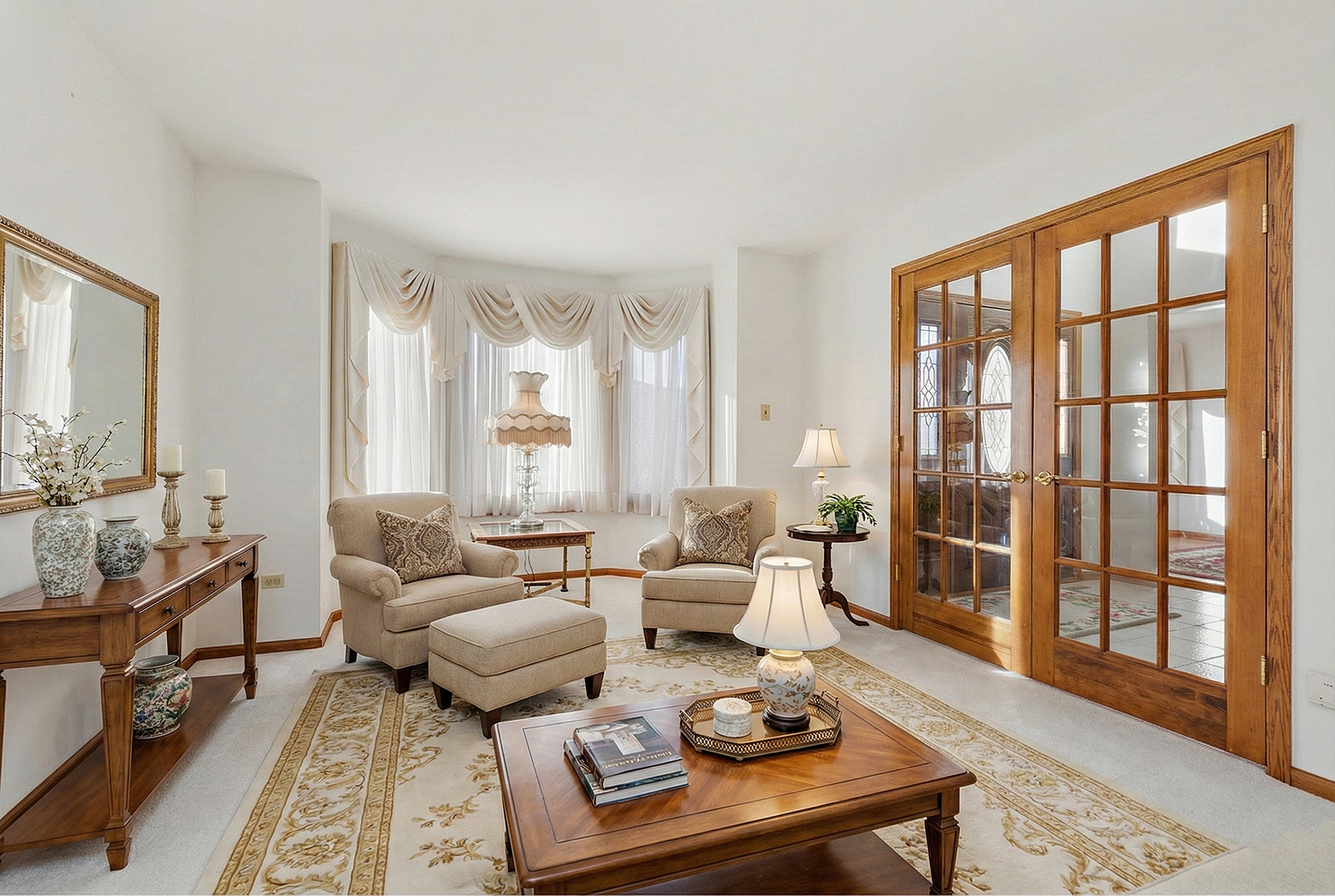 16221 Kingsport Road Orland Park, IL 60467 - Photo 6 of 58 a living room with furniture and a large window
