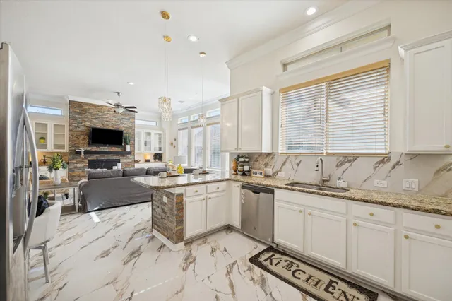 a bathroom with a granite countertop sink mirror and double