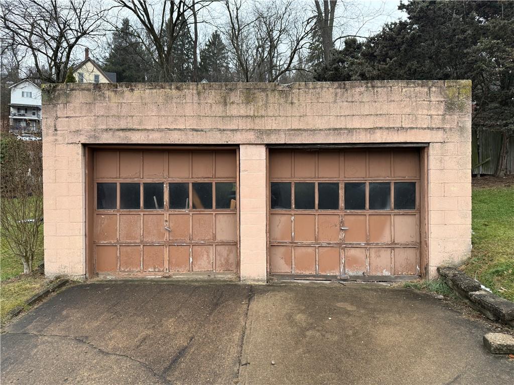 727 Thompson Street Turtle Creek, PA 15145 - Photo 3 of 25 a view of a house with a backyard