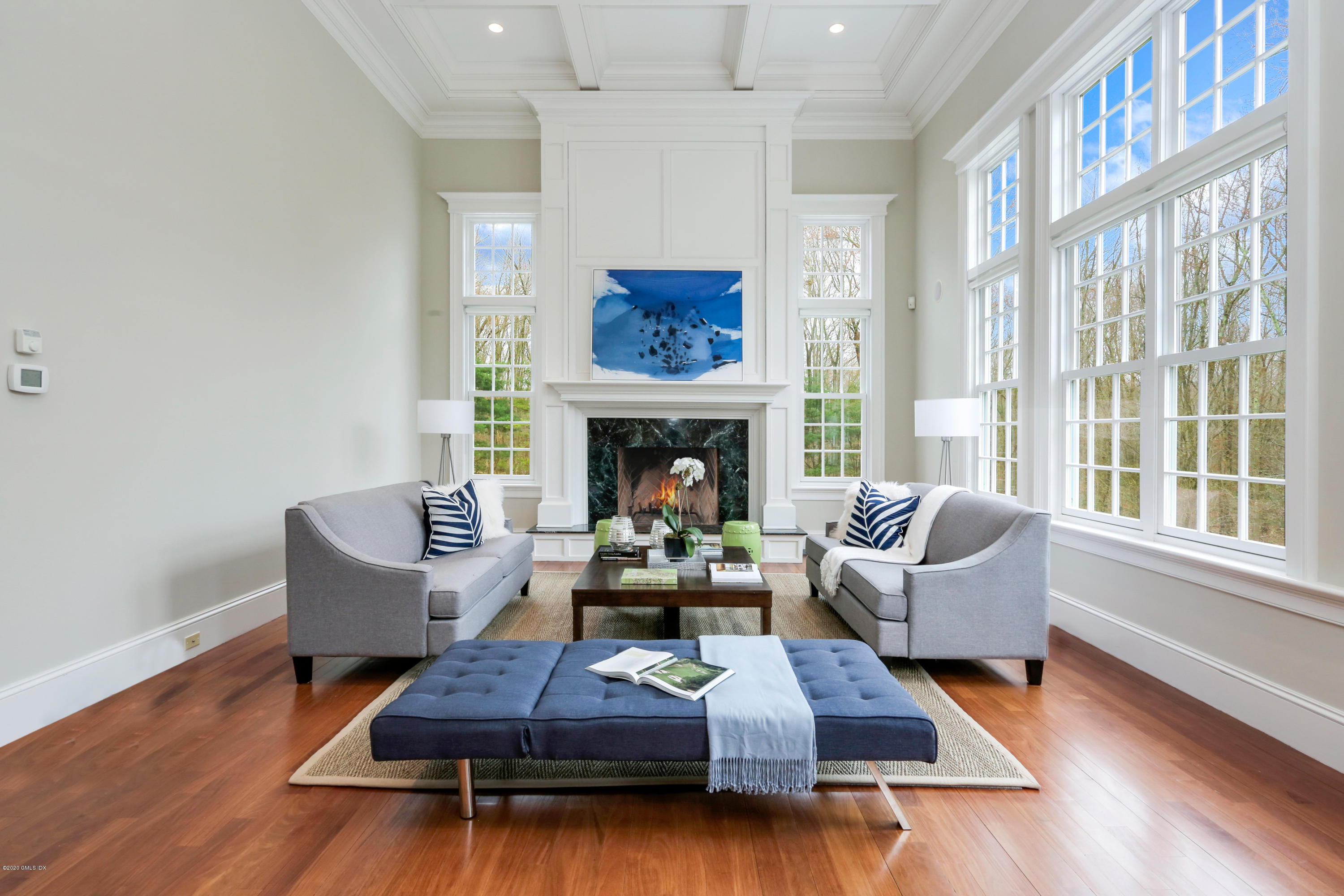 70 Old Mill Road Greenwich, CT 06831 - Photo 11 of 20 a living room with furniture fireplace and window