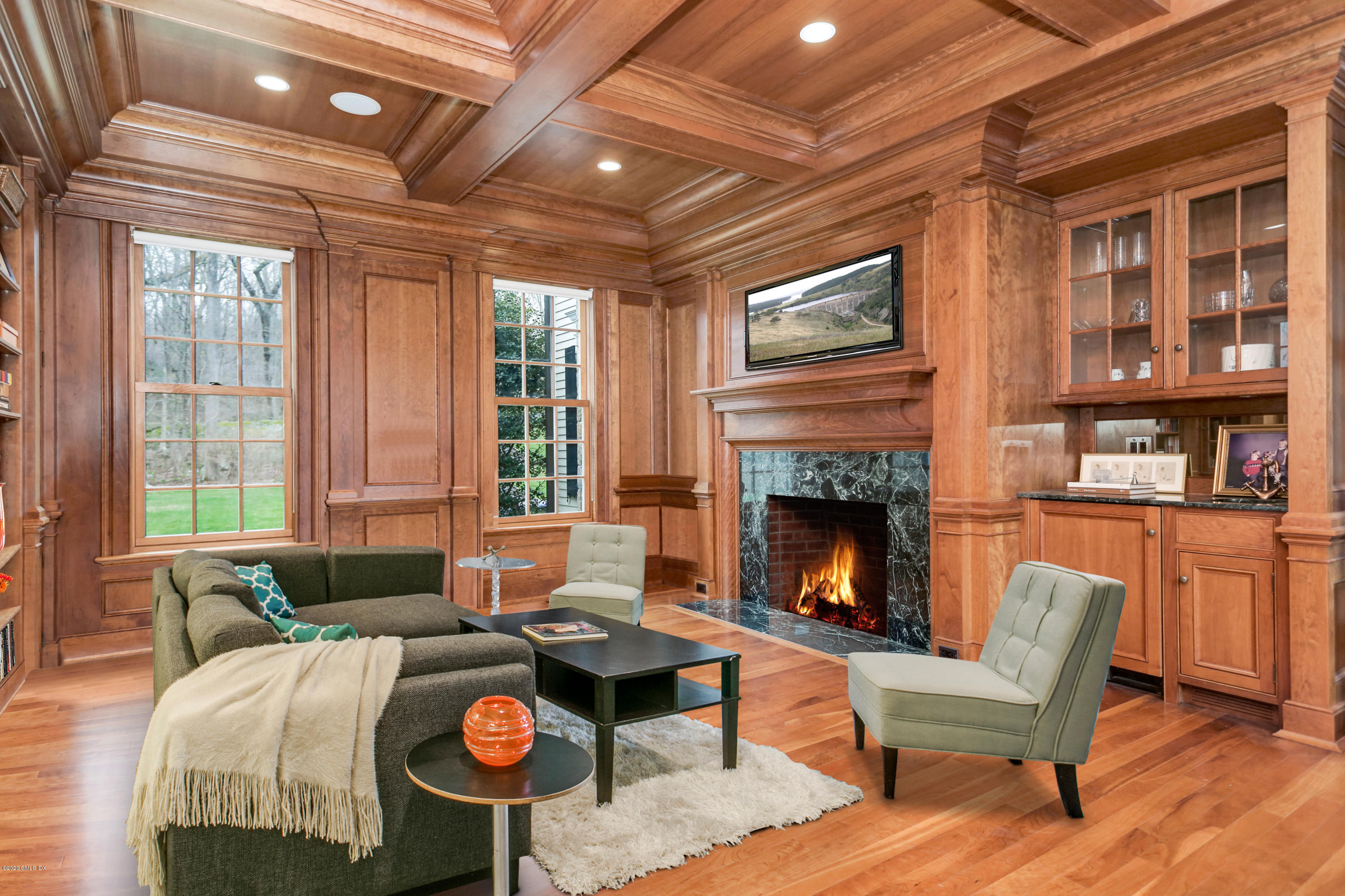 70 Old Mill Road Greenwich, CT 06831 - Photo 6 of 20 a living room with furniture a fireplace and wooden floor