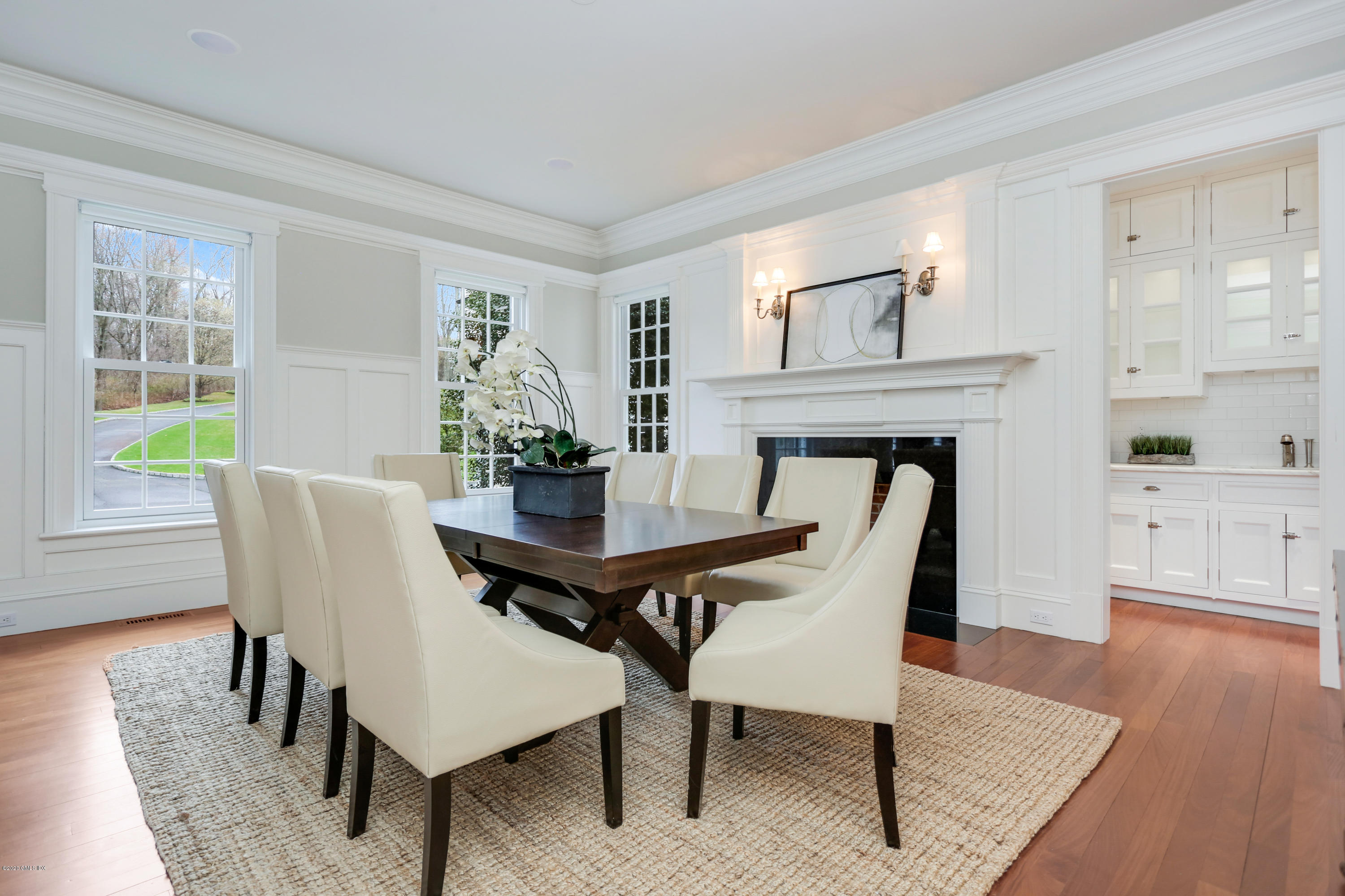 70 Old Mill Road Greenwich, CT 06831 - Photo 7 of 20 a view of a dining room with furniture and wooden floor