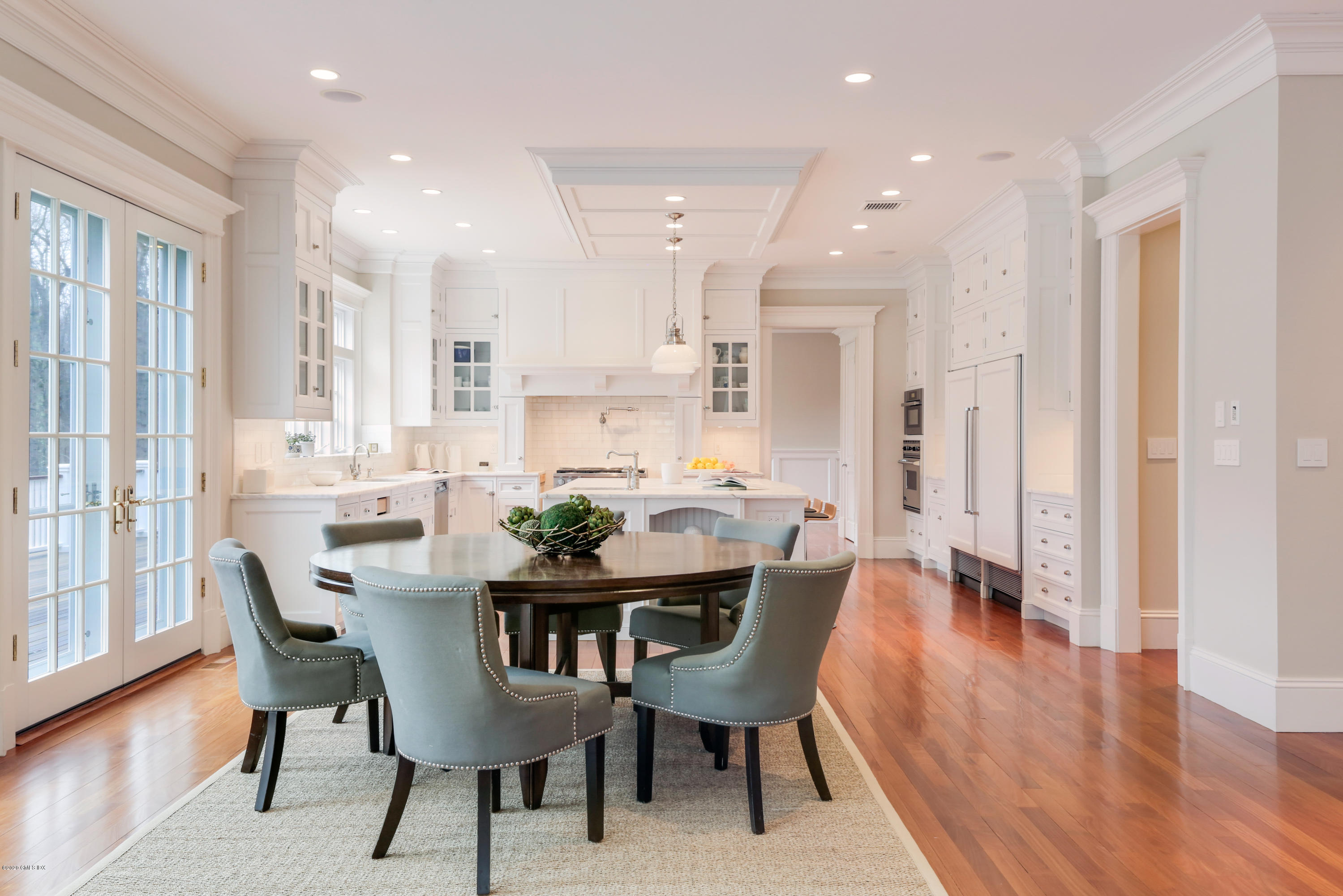 70 Old Mill Road Greenwich, CT 06831 - Photo 8 of 20 a view of a dining room with furniture and wooden floor