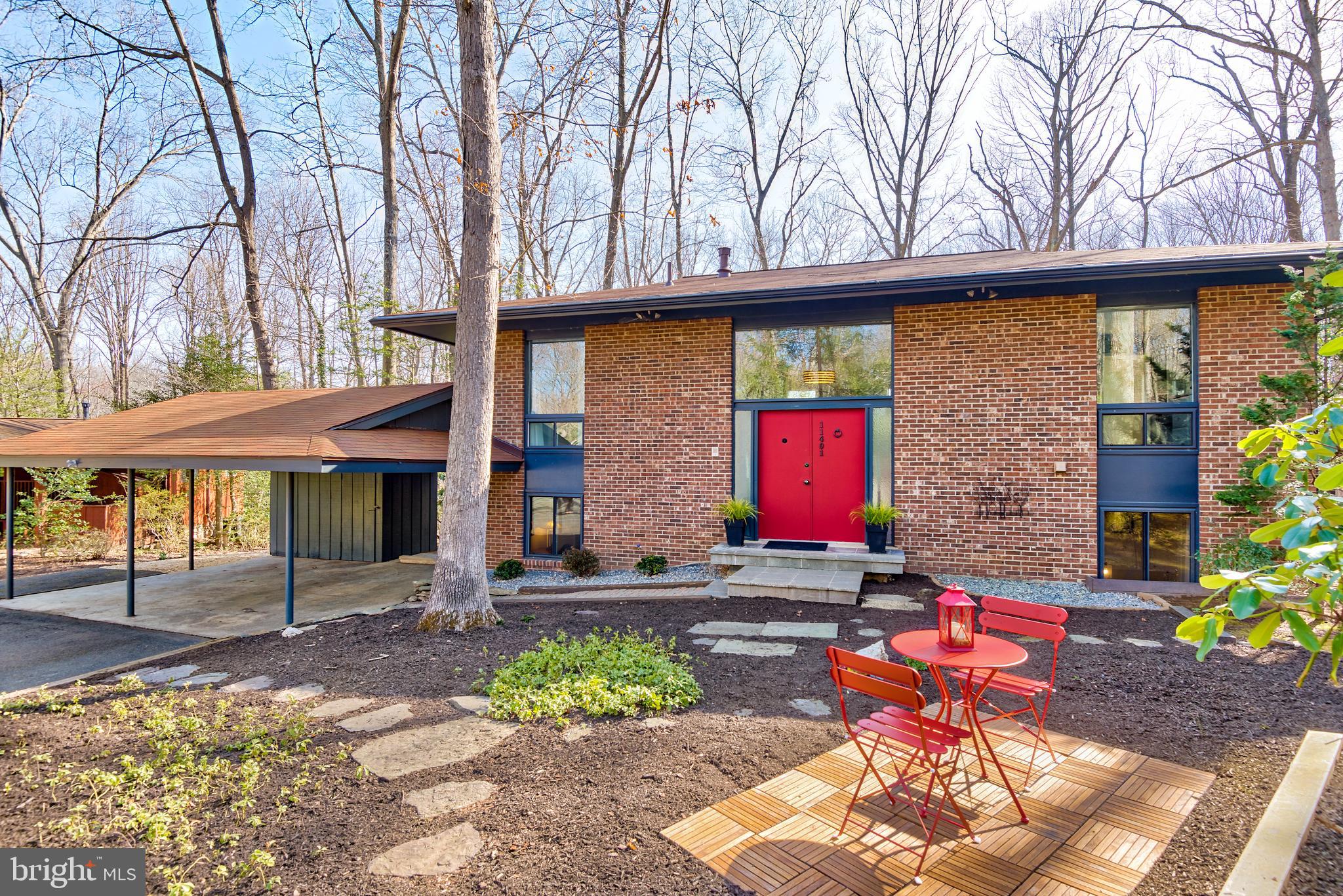 11401 Drop Forge Lane Reston, VA 20191 - Photo 1 of 38 a building with trees in front of it