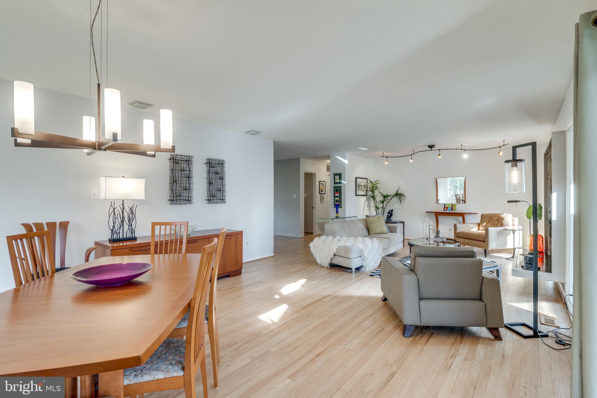 11401 Drop Forge Lane Reston, VA 20191 - Photo 11 of 38 a living room with furniture and a wooden floor