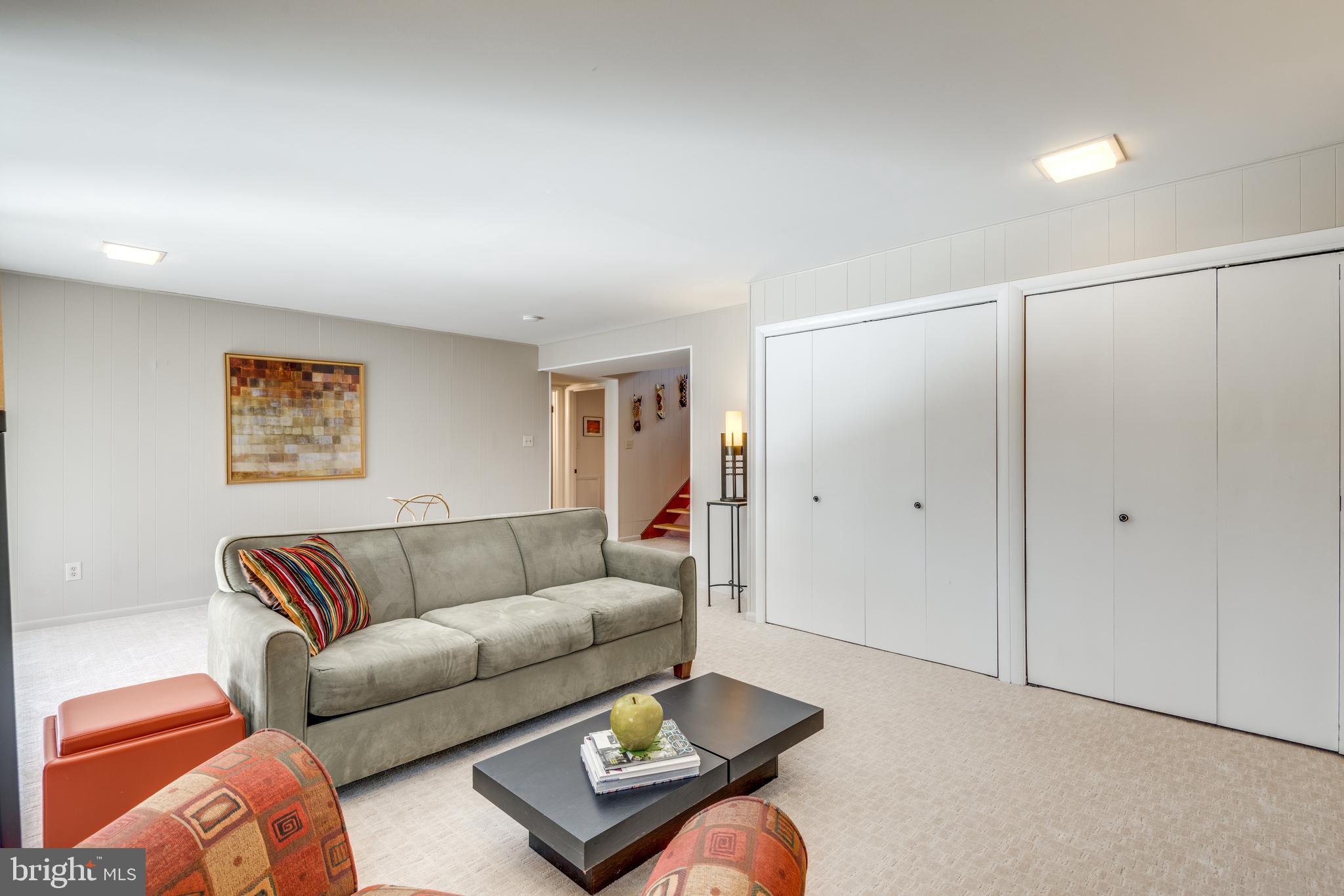 11401 Drop Forge Lane Reston, VA 20191 - Photo 21 of 38 a living room with furniture and wooden floor