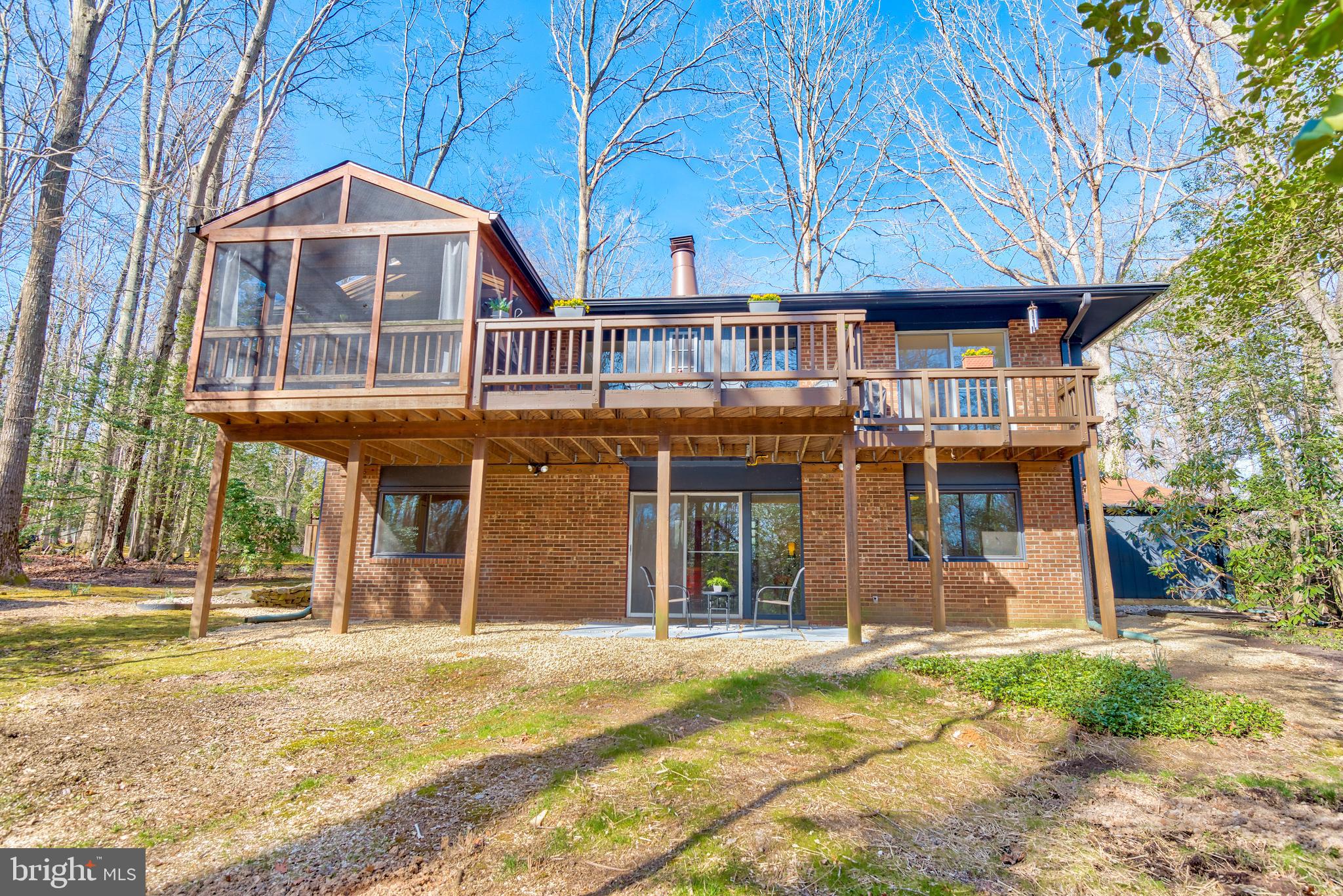 11401 Drop Forge Lane Reston, VA 20191 - Photo 31 of 38 a front view of a house with a garden