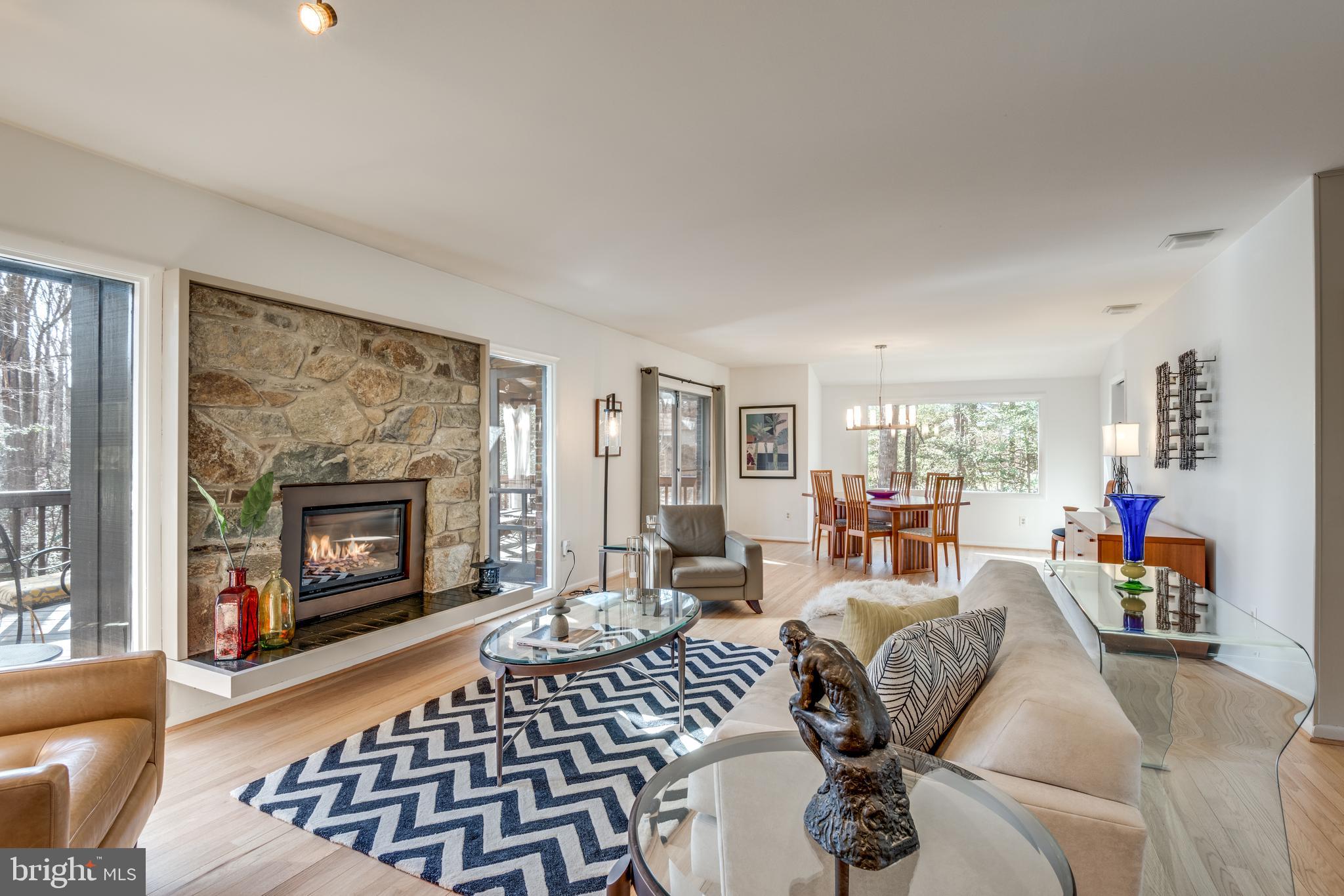 11401 Drop Forge Lane Reston, VA 20191 - Photo 7 of 38 a living room with furniture fireplace and window