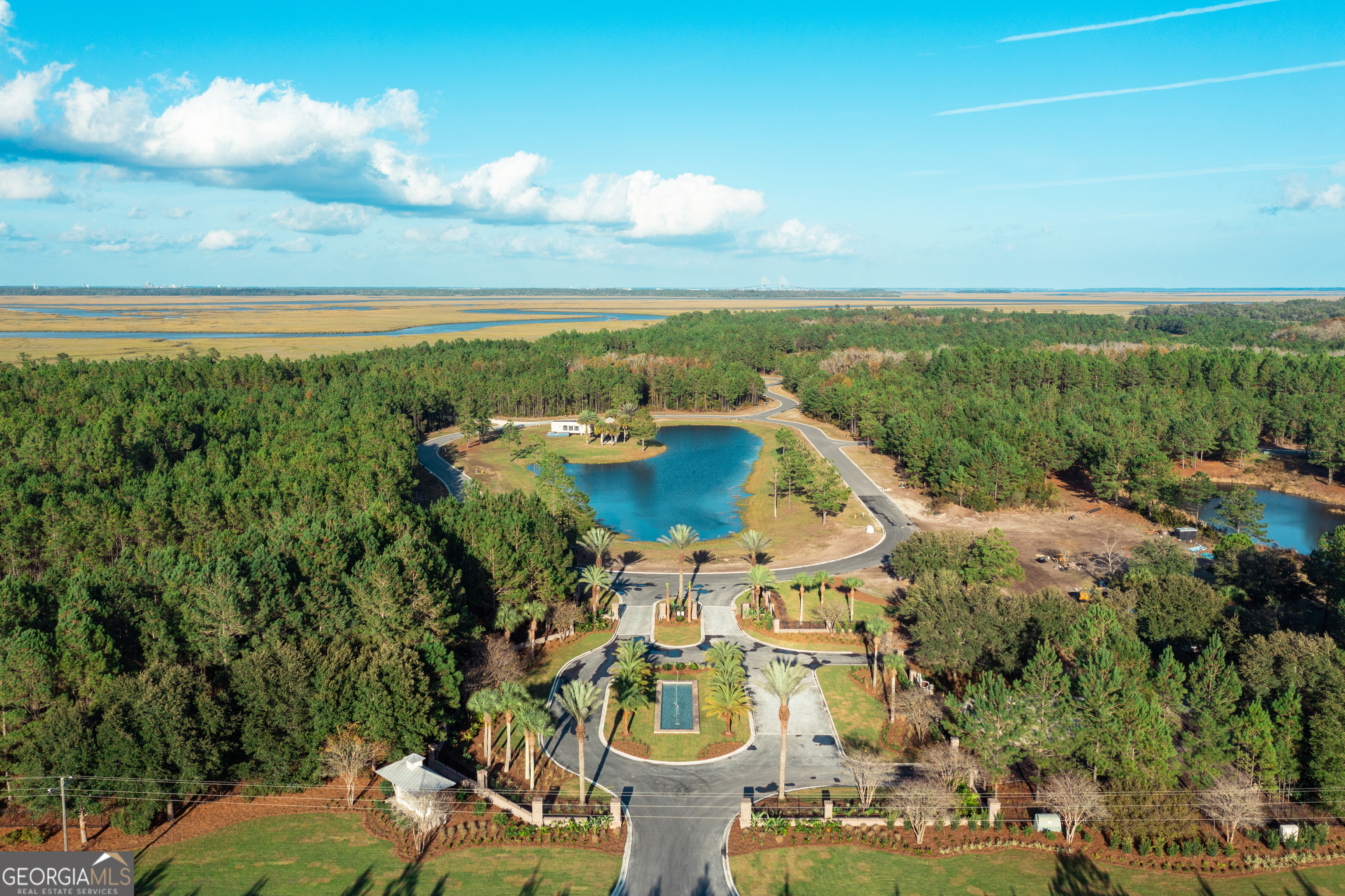 Lot 548 Beacon Pointe Parkway Waverly, GA 31565 - Photo 3 of 15 a view of a city with lawn chairs