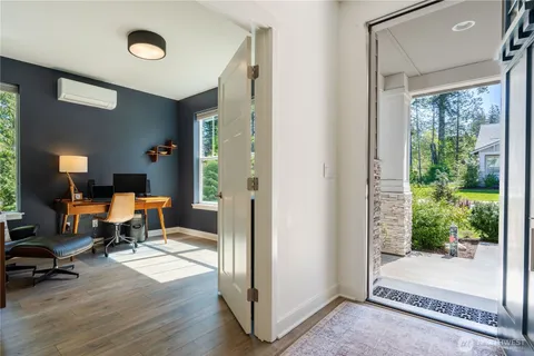 a room with furniture and a gate