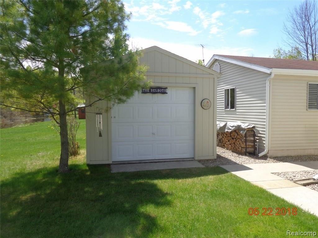 14015 Mar-Ral Road Alpena, MI 49707 - Photo 10 of 45 Large shed with roll up door