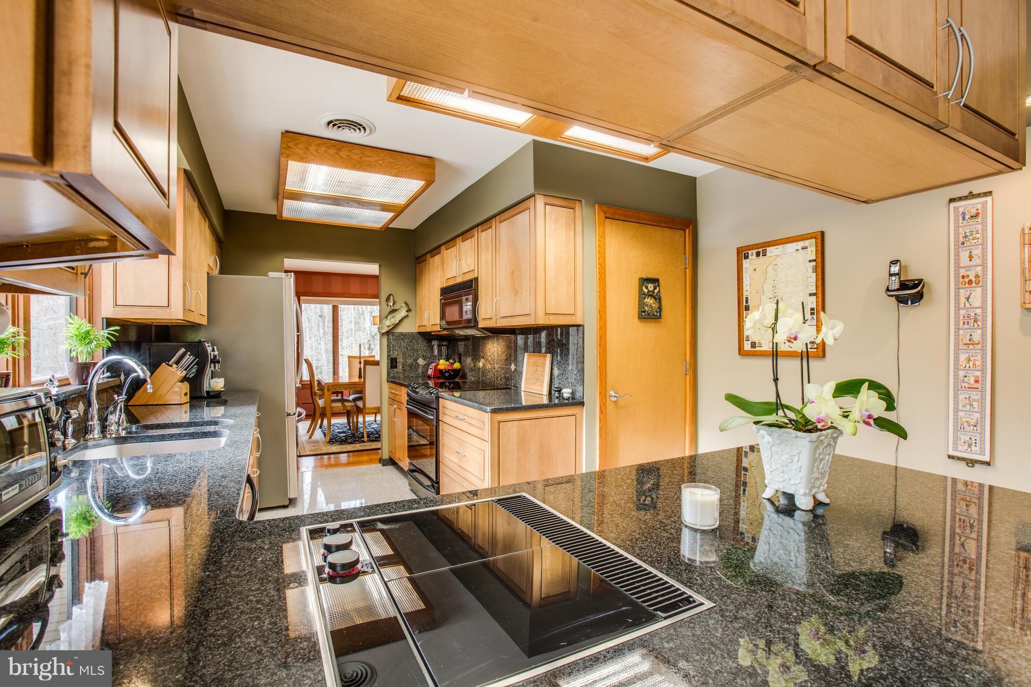 6600 Fox Ridge Road Spotsylvania, VA 22551 - Photo 4 of 30 Gleaming Kitchen with Stove and Separate Griddle.