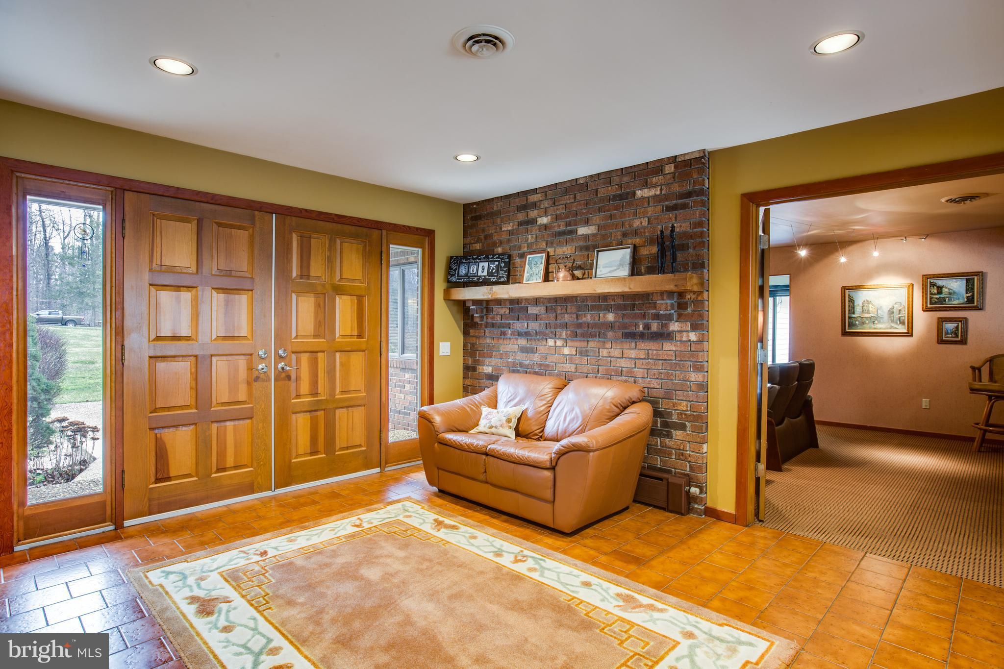 6600 Fox Ridge Road Spotsylvania, VA 22551 - Photo 10 of 30 Foyer is so Welcoming with Space and Warm Hues.