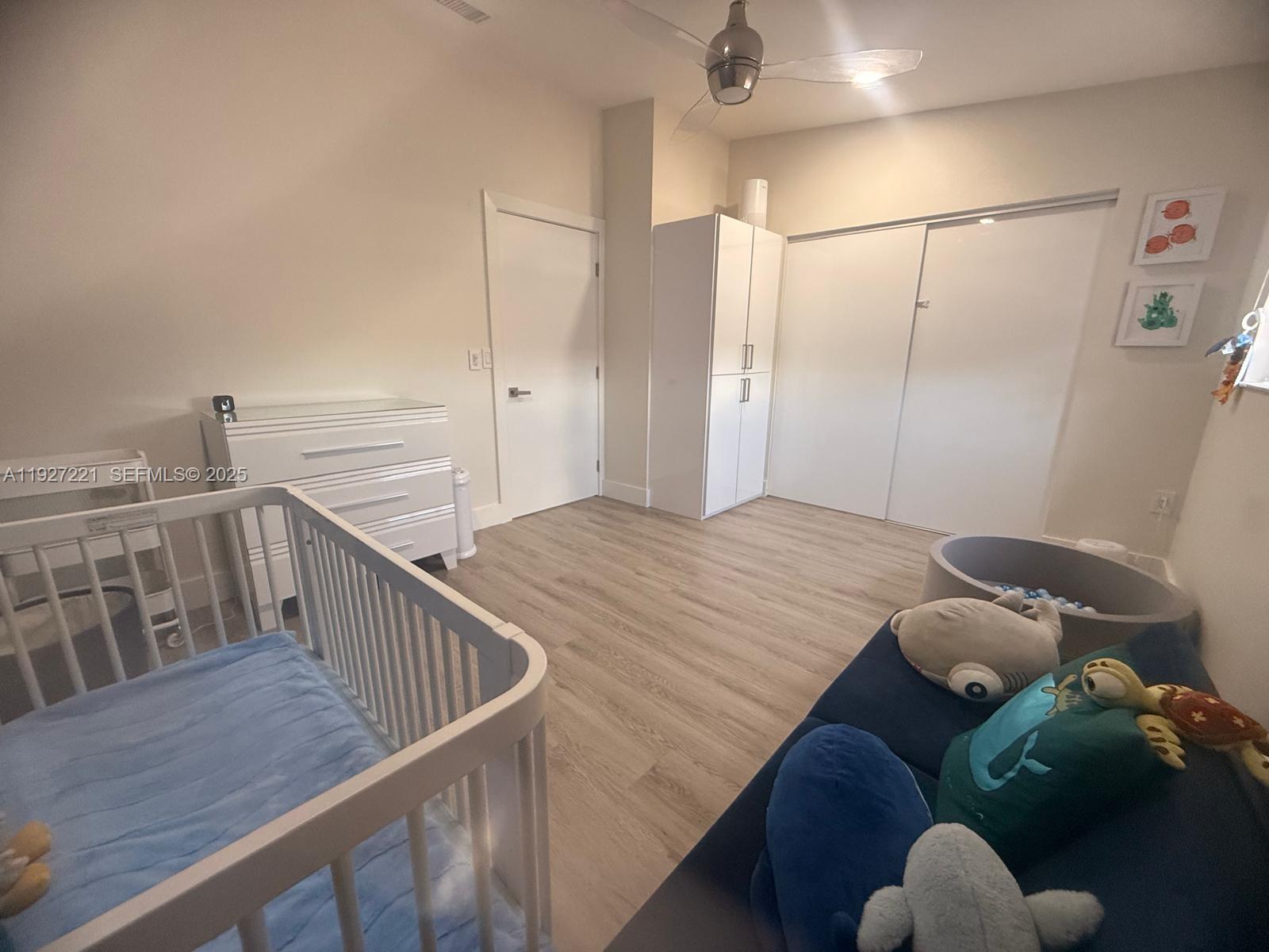 6864 Northwest 166th Terrace, Unit 903 Miami Lakes, FL 33014 - Photo 14 of 29 a view of entryway with wooden floor